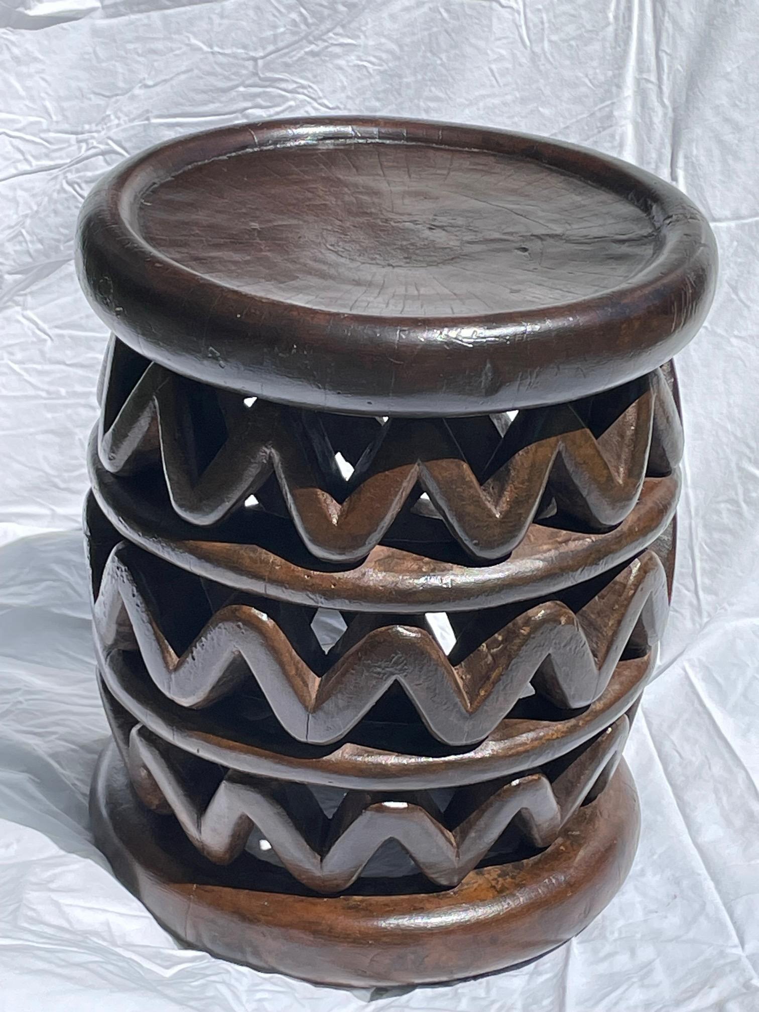 1950's Cameroon Africa carved African black wood in traditional zig zag design.
Can also be used as a cocktail table.
Kapok wood.
Recently refinished and polished.