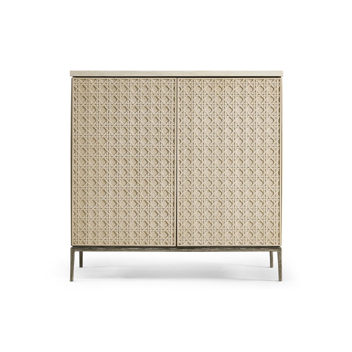 This carved woven Credenza is a stunning example of craftsmanship and design, perfect for adding a touch of tropical glamour to your home.

The digitally carved, traditional woven cane design on the cabinet doors is nothing short of mesmerizing.