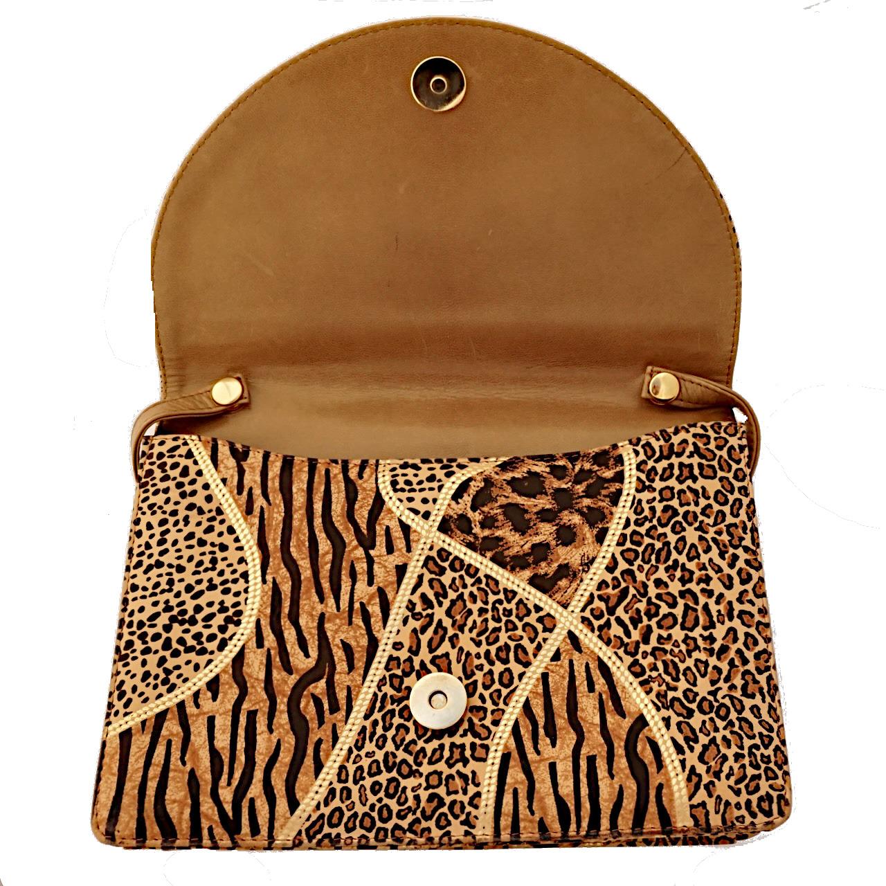 Stylish Carvela animal print faux leather bag with gold highlights, and a magnetic clasp. Measuring width 22.1 cm / 8.7 inches at the base, height 16.2 cm / 6.37 inches, and with a strap drop of 43.5 cm / 17.1 inches at the shortest length (the