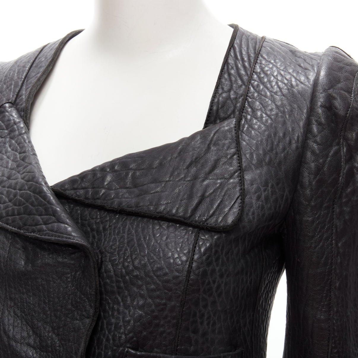 CARVEN black textured leather padded shoulder double breasted blazer IT38 XS
Reference: ANWU/A00758
Brand: Carven
Designer: Guillaume Henry
Material: Leather
Color: Black
Pattern: Solid
Closure: Snap Buttons
Extra Details: Croc pattern pebble