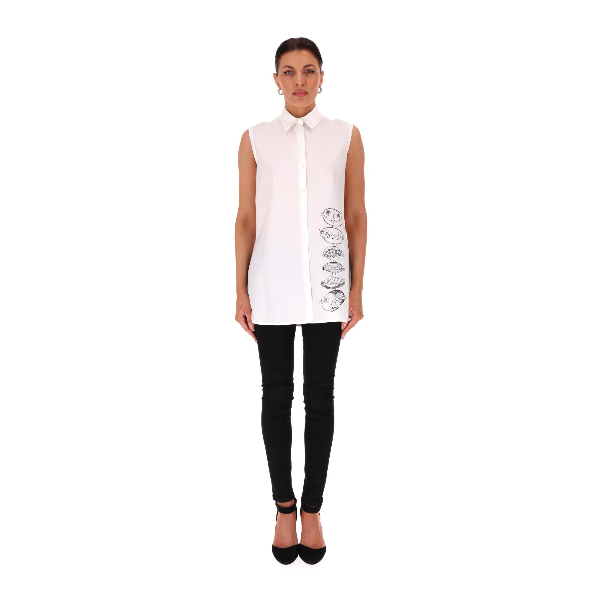 Carven Embroidery Detail Cotton Shirt

Sleeveless white shirt crafted from cotton and designed with minimalistic Birds embroidery in black.

Featuring a classic collar and centre button fastening.

Detailed with silver 'C' charm to rear.

Rrp