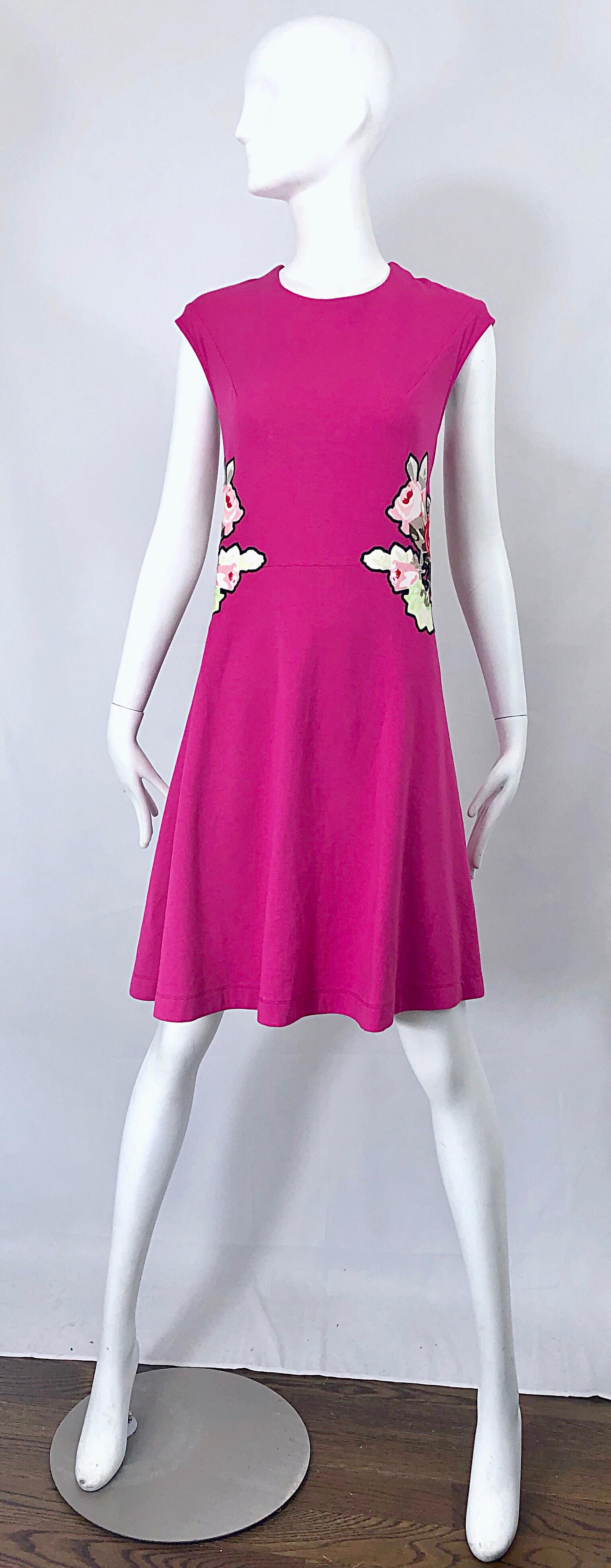 Pretty CARVEN hot pink 'Bouquet of Roses' hot pink A - Line cotton dress! Fitted cap sleeve bodice with a forgiving flattering skirt. Large slimming roses patch at each side of the waist. Vibrant colors of pastel green, light pink, red, brown, grey