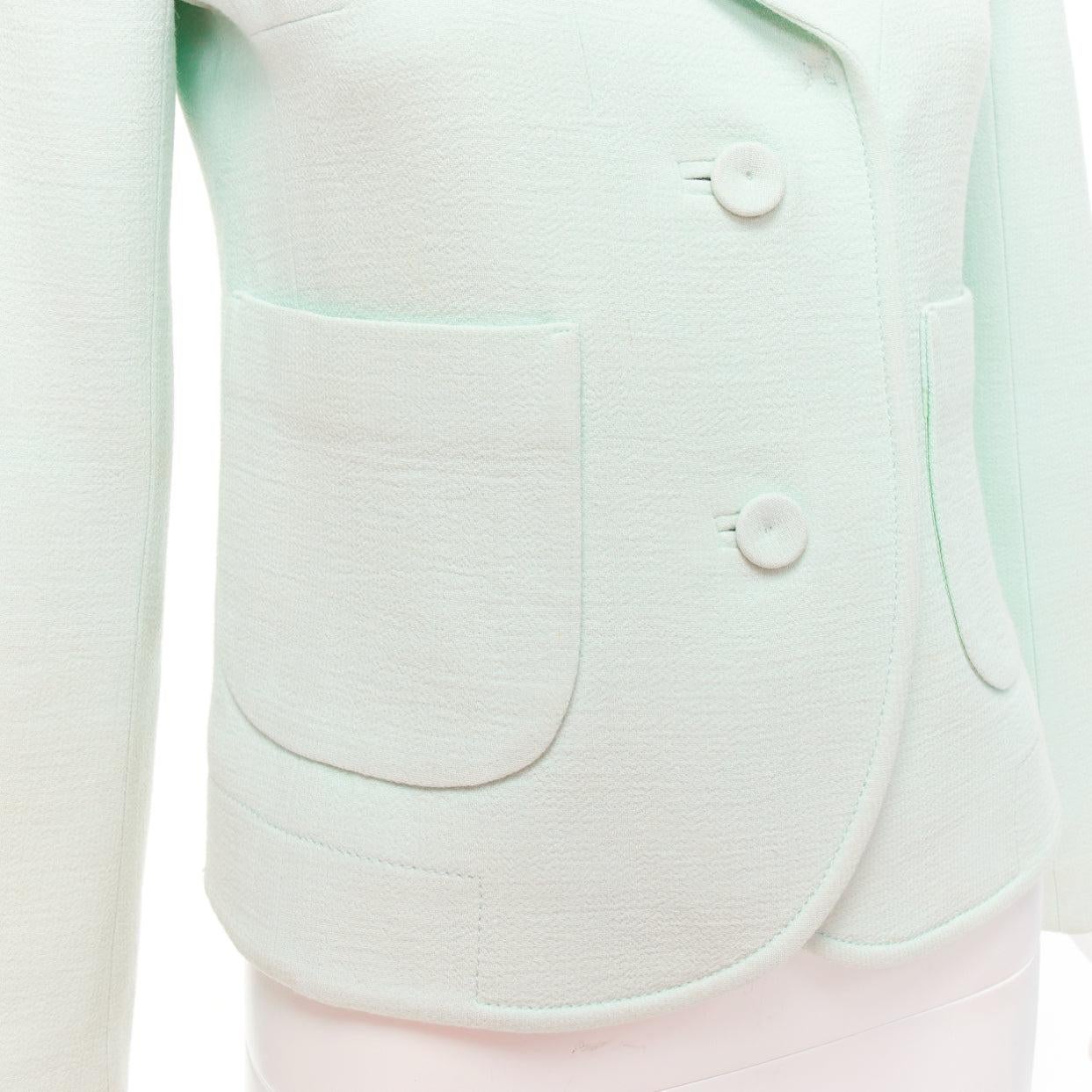 CARVEN pastel green viscose virgin wool shoulder darts blazer FR36 S
Reference: LACG/A00429
Brand: Carven
Designer: Guillaume Henry
Material: Viscose, Virgin Wool
Color: Green
Pattern: Solid
Closure: Button
Lining: Green Fabric
Extra Details: Fabric