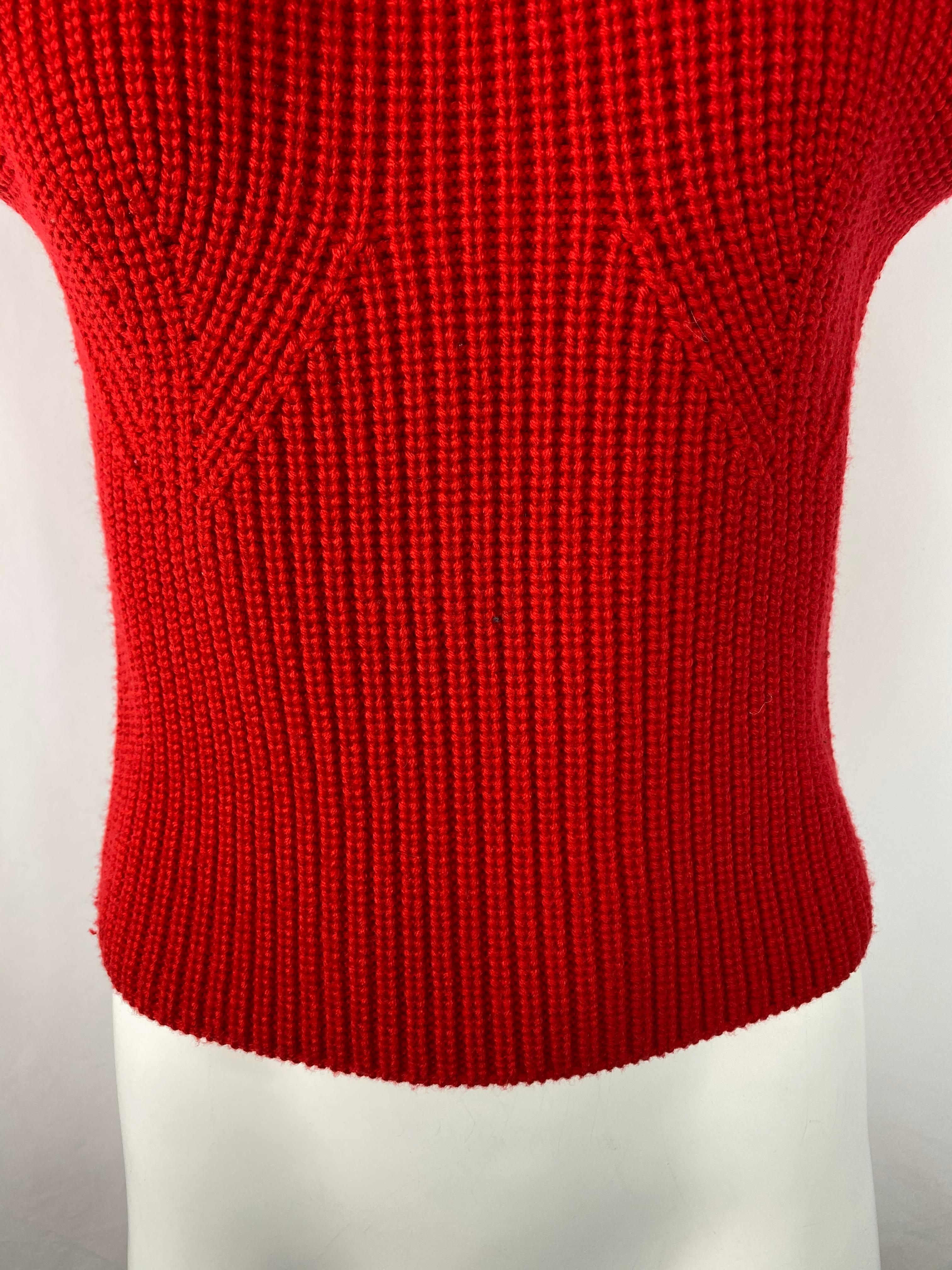 red sweater vest
