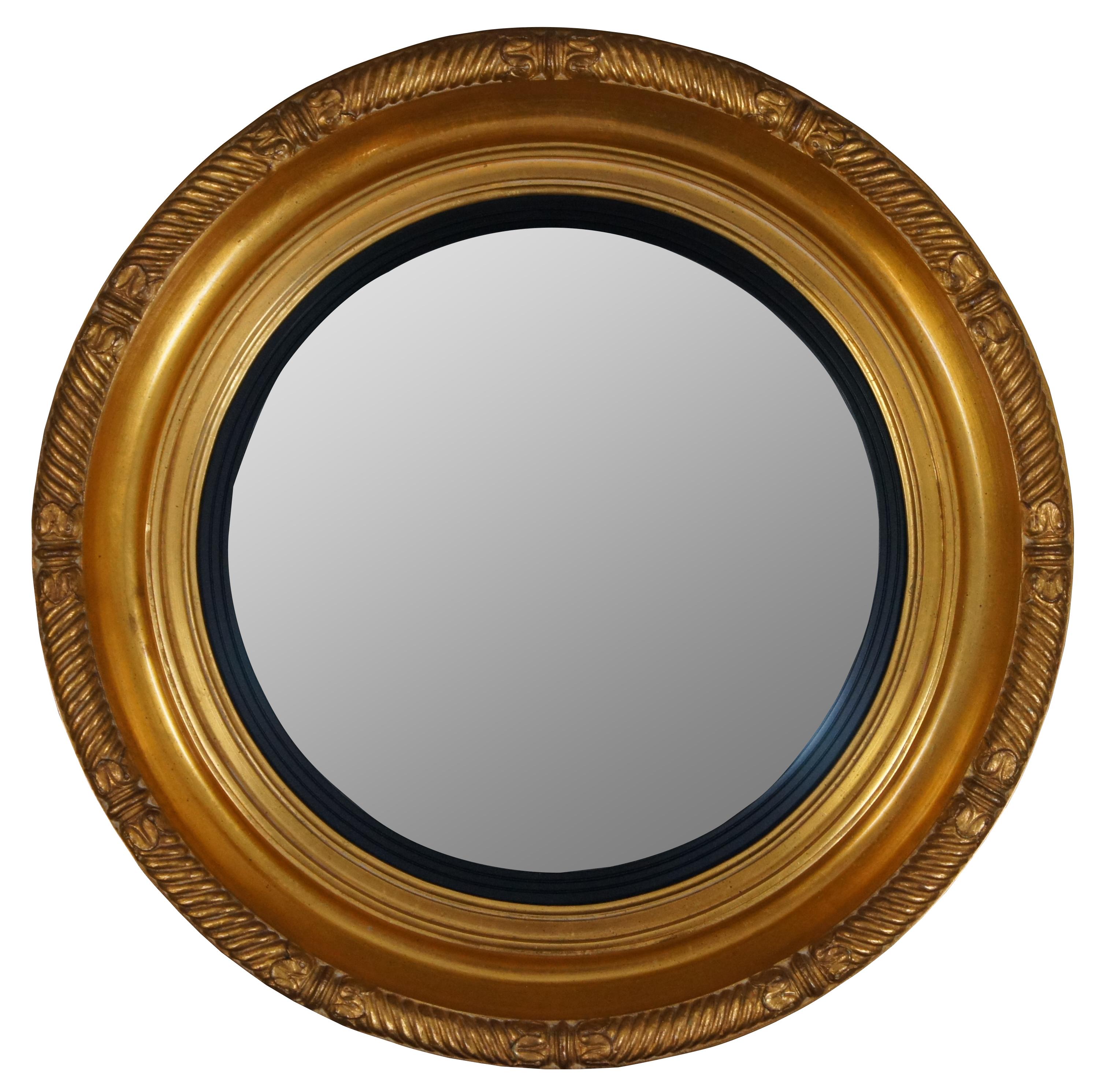 Vintage Regency style Carvers’ guild of West Groton, MA – Maritime Nautical Rondel round convex wall / hall / vanity mirror #5931, finished in antique gold leaf.

Measures: 26” x 2.5” x 26” / Mirror – 16” x 16” (width x depth x height).