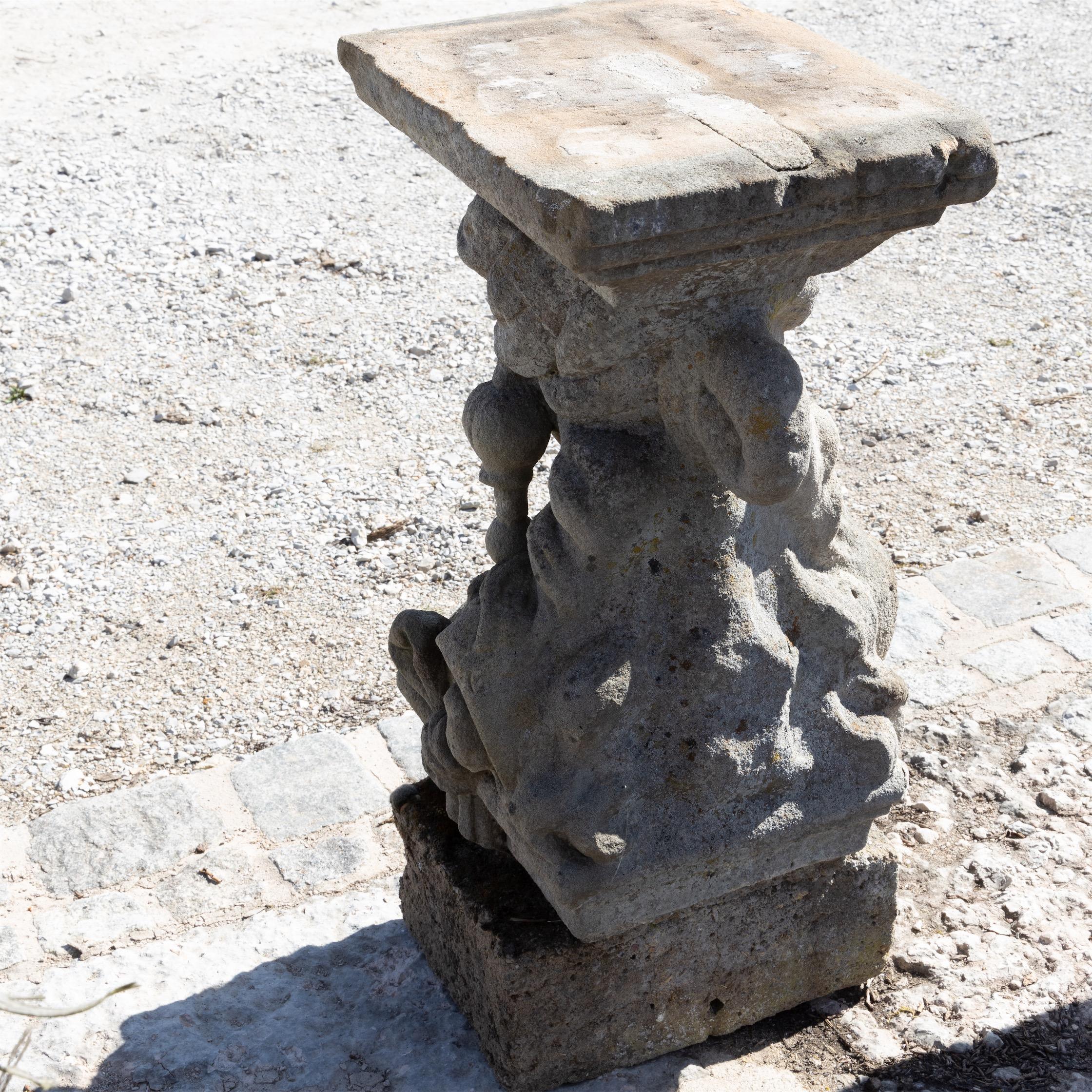 Fragment of a caryatid made of sandstone, very beautifully worked out, standing on a rectangular base. The shelf has the following dimensions: 35 x 45 cm. Wonderful patina.
 