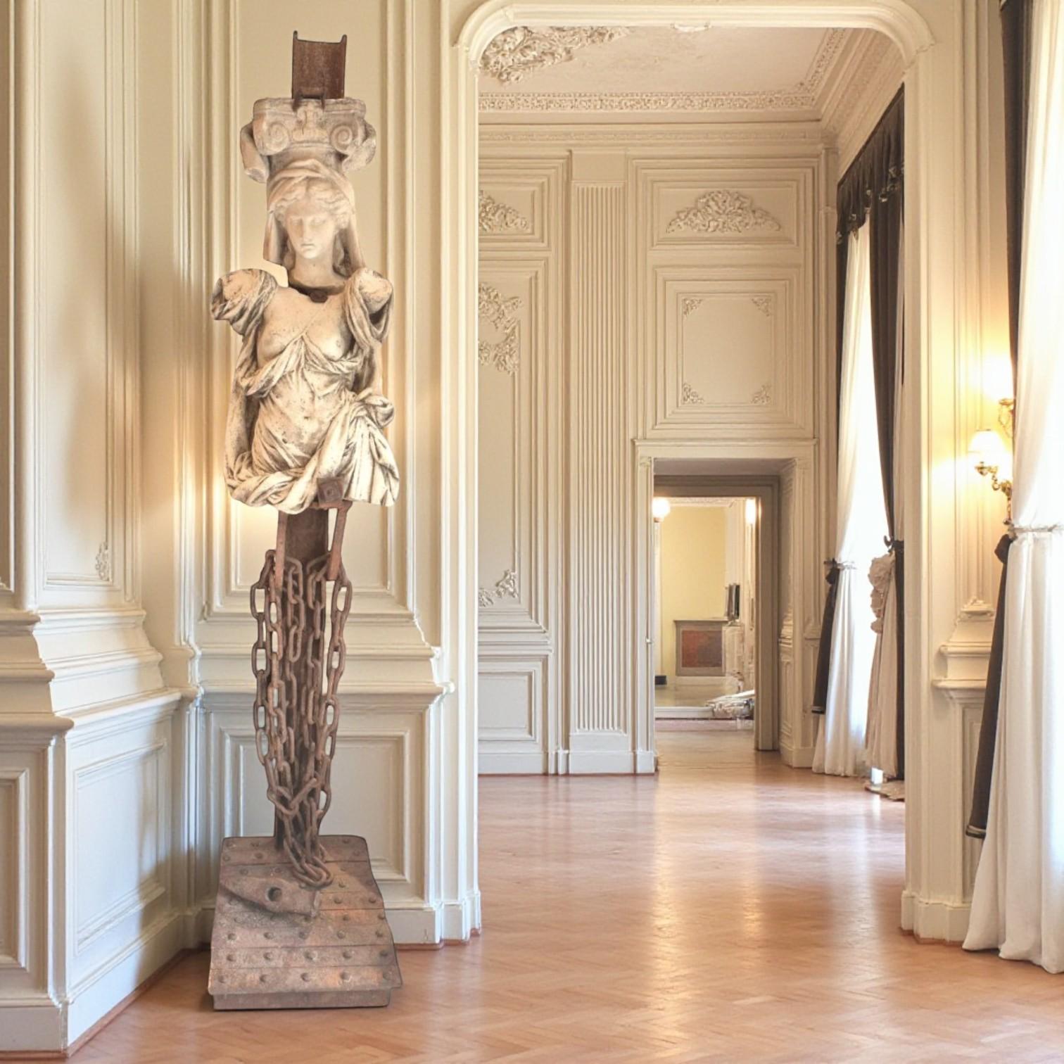 Cariatide - France, 2024
Acier patiné par la rouille et pierre antique
Pièce unique, signée au dos

Michel Froment (né en 1951) est une figure marquante du design et de la sculpture française du XXe siècle, reconnu pour ses créations qui font le