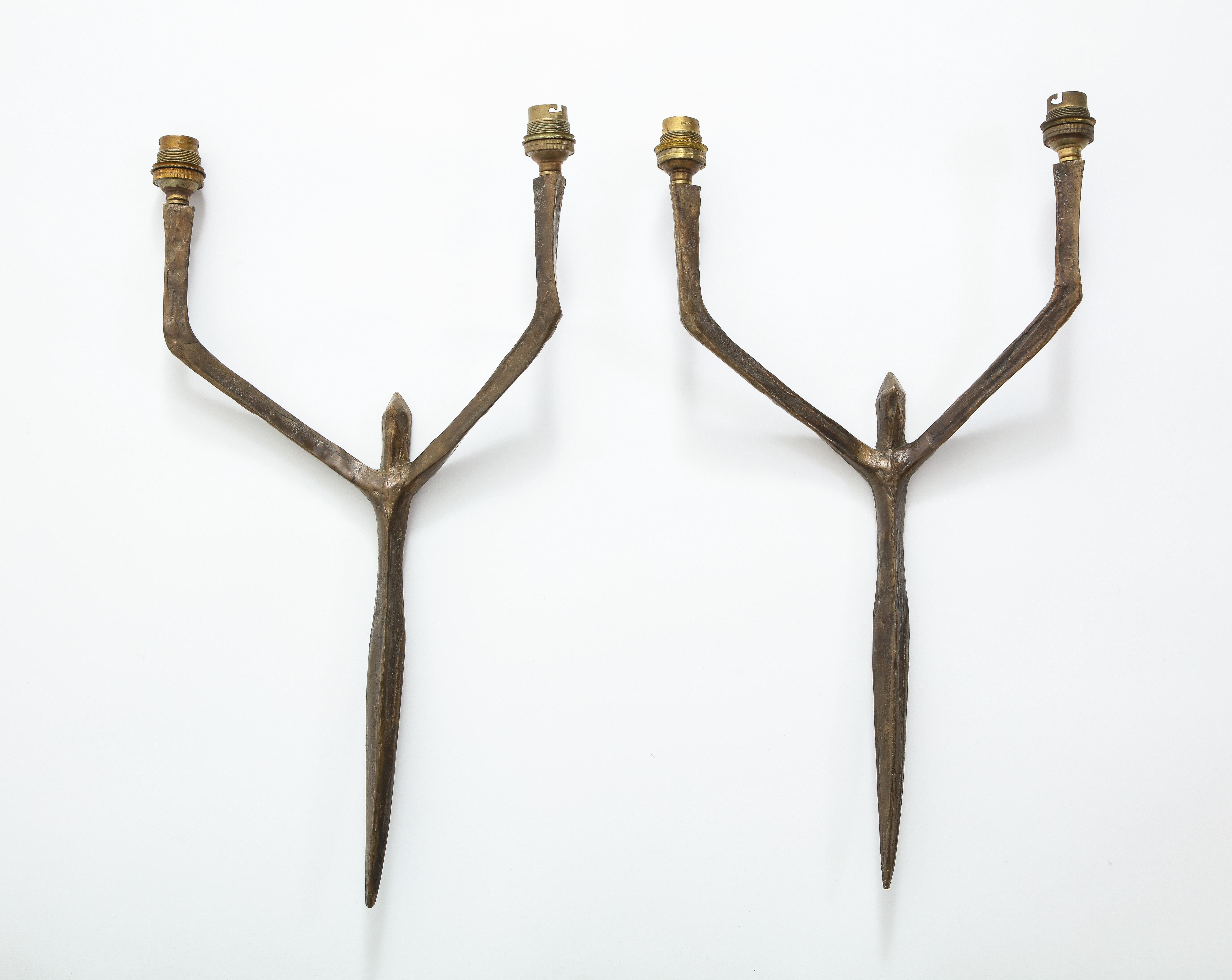 Pair of patinated bronze male caryatides sconces by Felix Agostini, France, 1960.

Back plates not included. Rewire required. 

 
