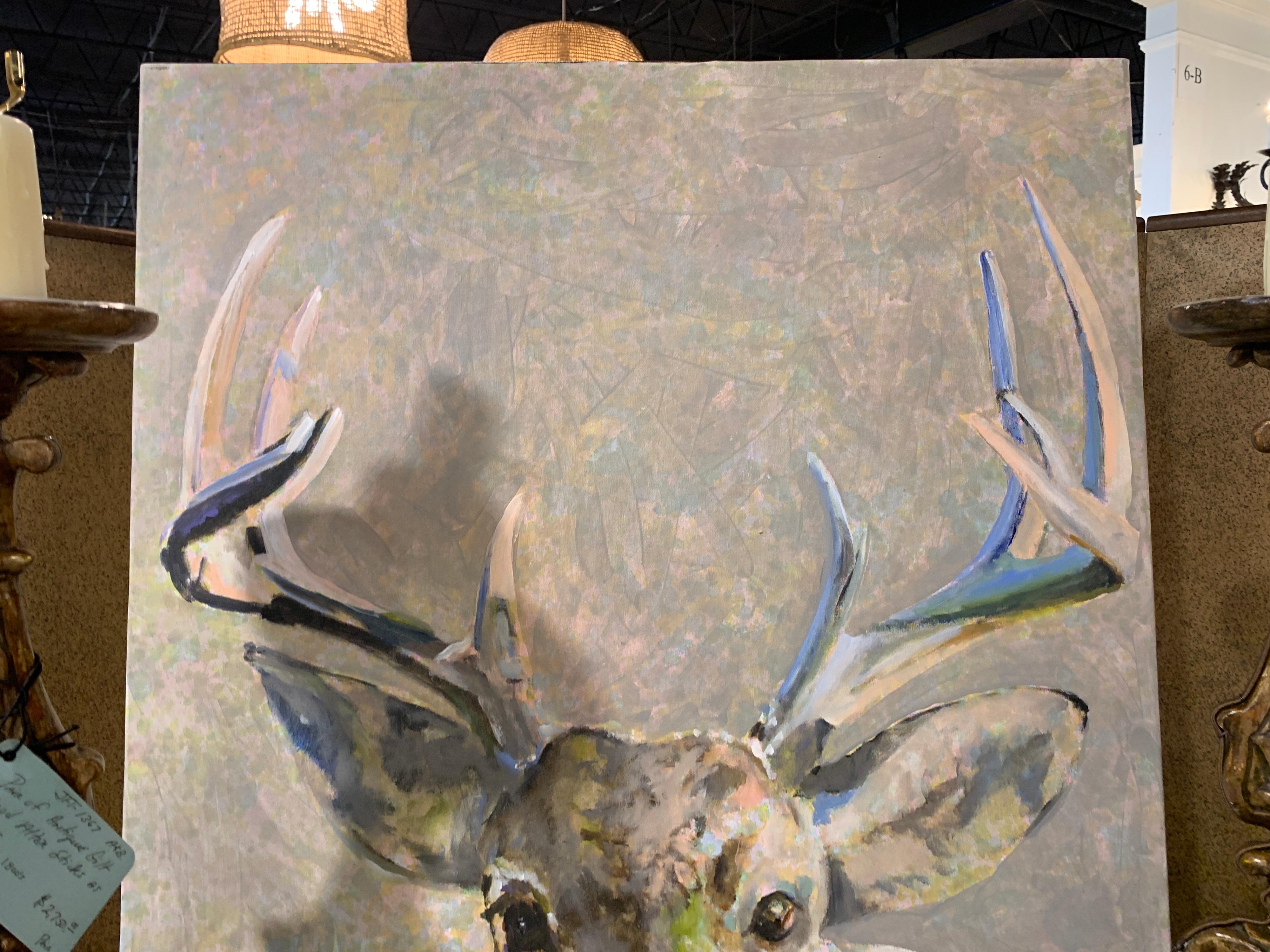 'As A Deer' is a large vertical mixed media on canvas deer painting created by American artist Carylon Killebrew in 2021. Featuring a palette made of gray, brown, black and a touch of blue tones, the painting centers our attention on a closeup of