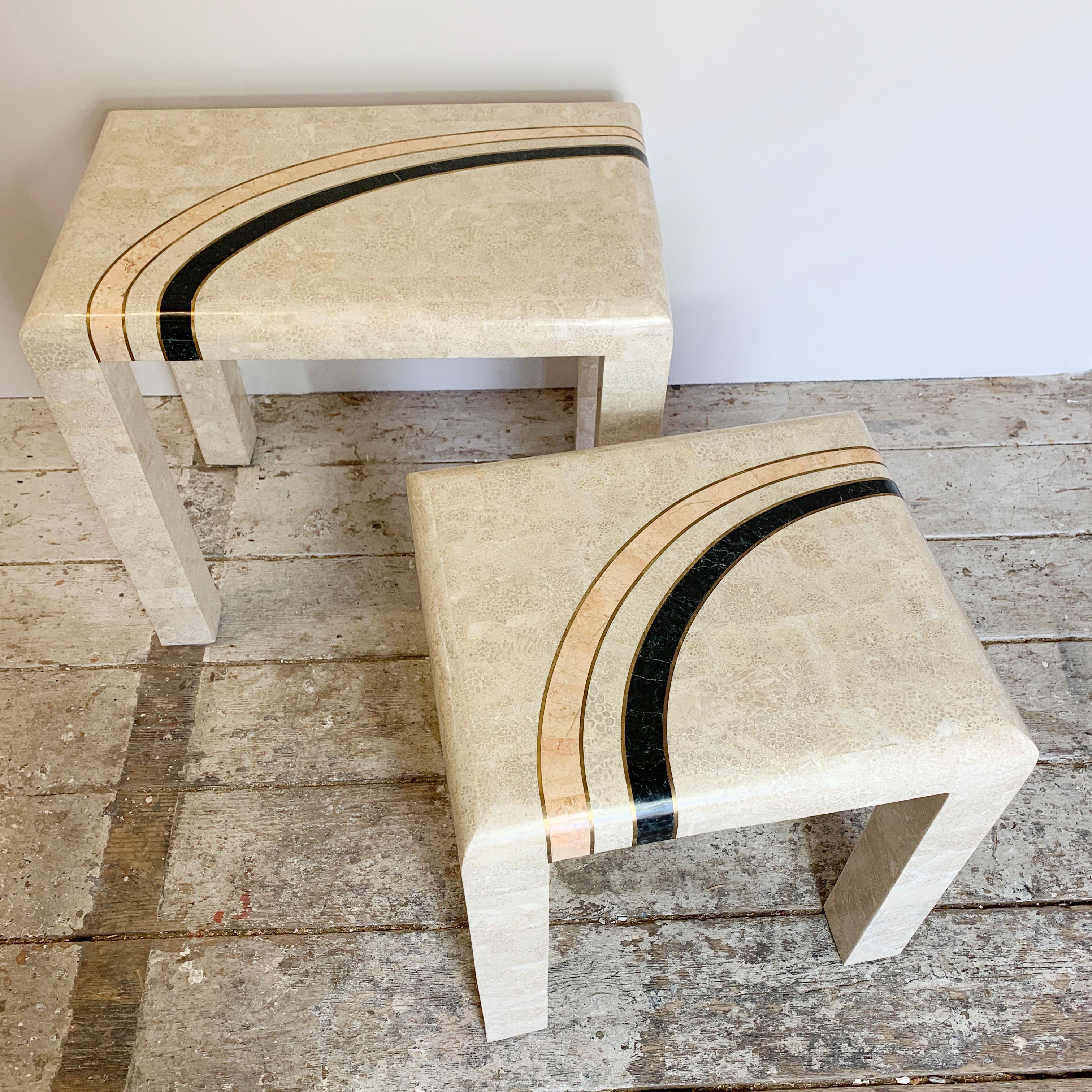 Casa Bique nesting tables
1980s
Attributed to designer Robert Marcius for Casa Bique
A pair of tables in tessellated marble
Featuring an abstract curve design in black and soft pink, accented with brass inlay
Constructed of tessellated marble/fossil