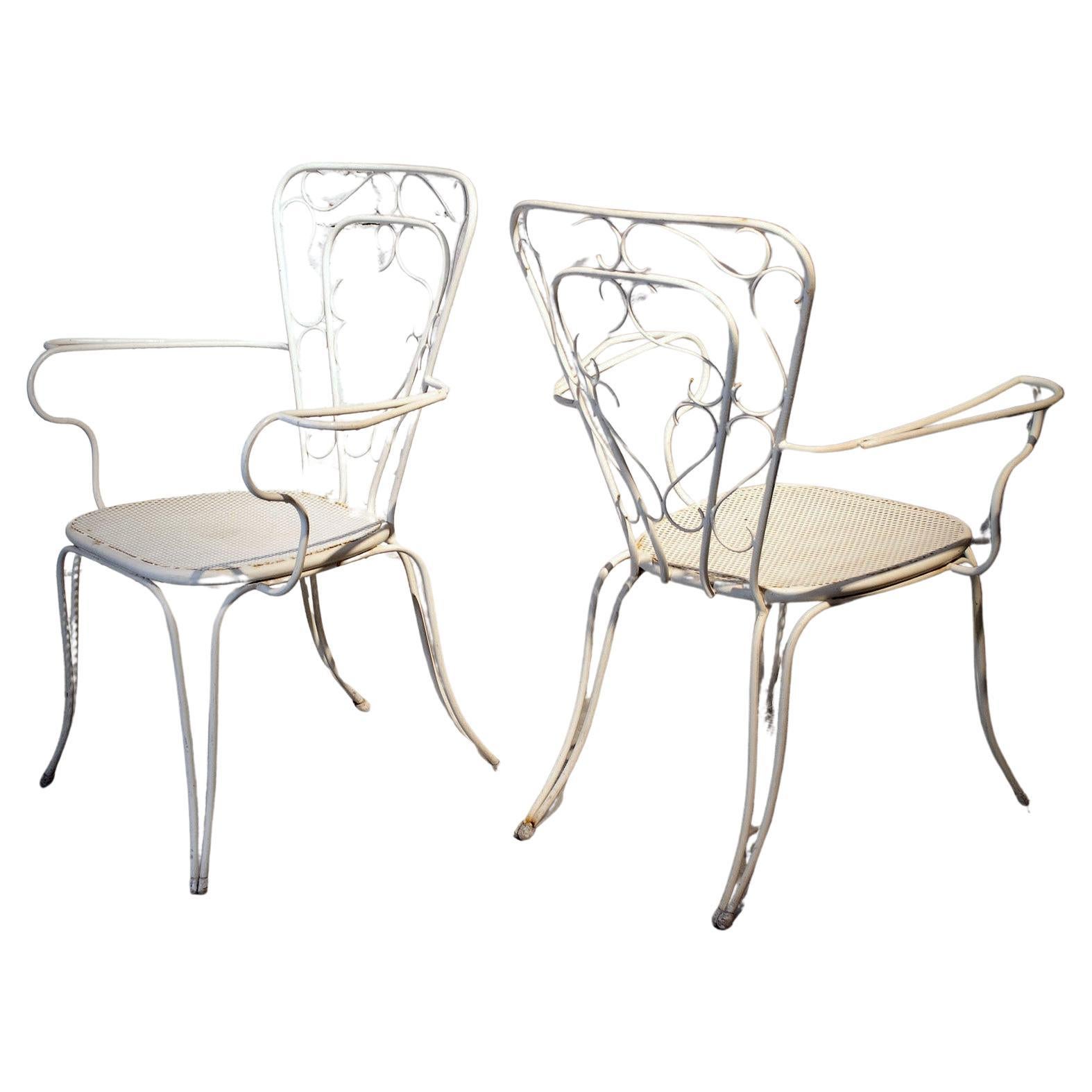 Lio Carminati set of four chairs iron 1950s