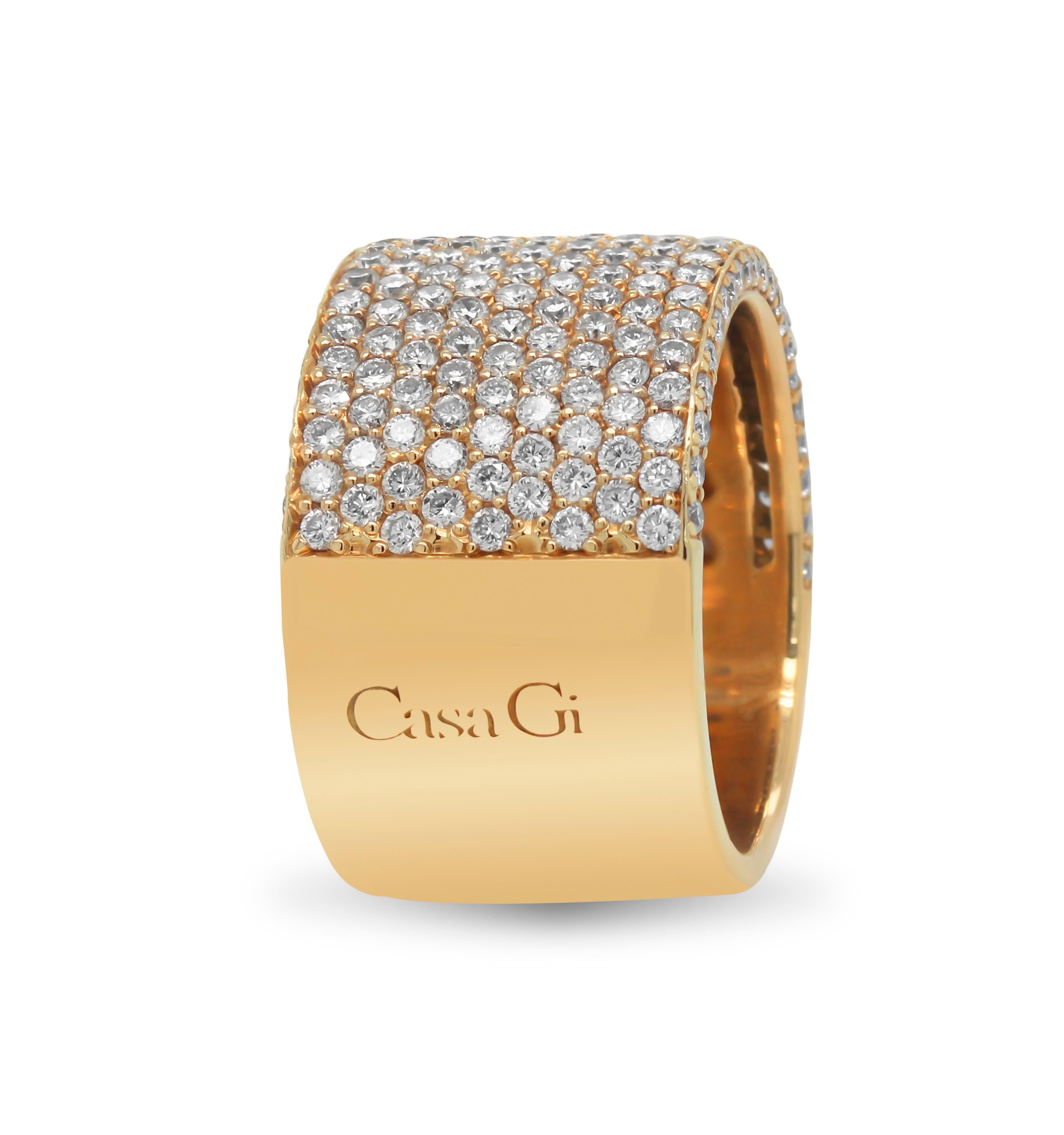Casa Gi Designer 18K Yellow Gold Diamond Wide Cigar Band Ring 

This state-of-the-art wide band ring by Casa G features pavé set diamonds half way.

2.95 carat G color, VS clarity diamonds

13.6mm band width.

Size 7. Sizable by request. 