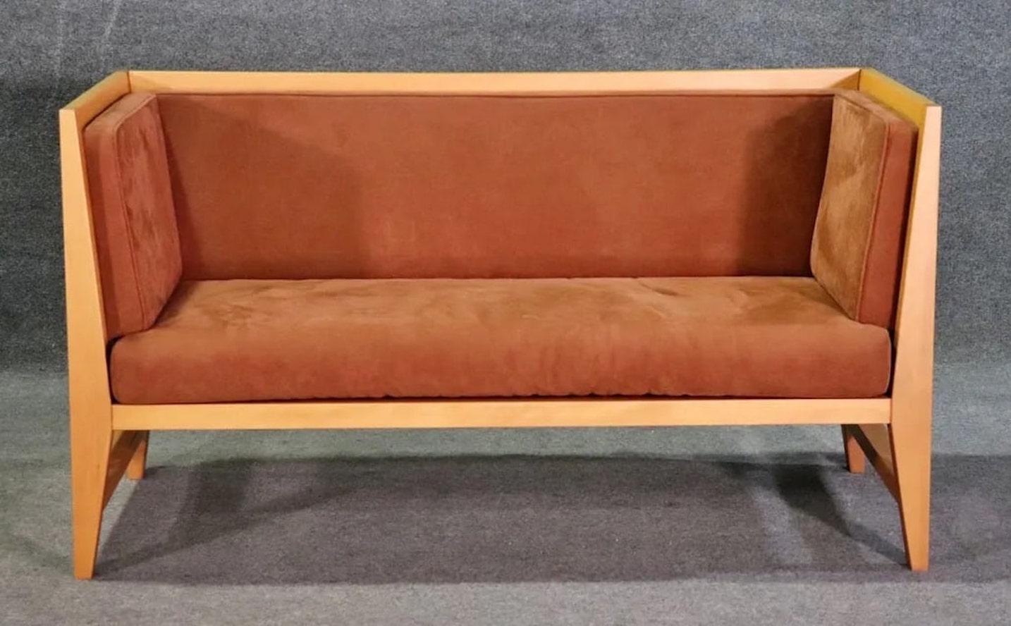 Modern style loveseat by Casa Nova. Suede upholstered on all three sides with blonde wood frame.
Please confirm location NY or NJ