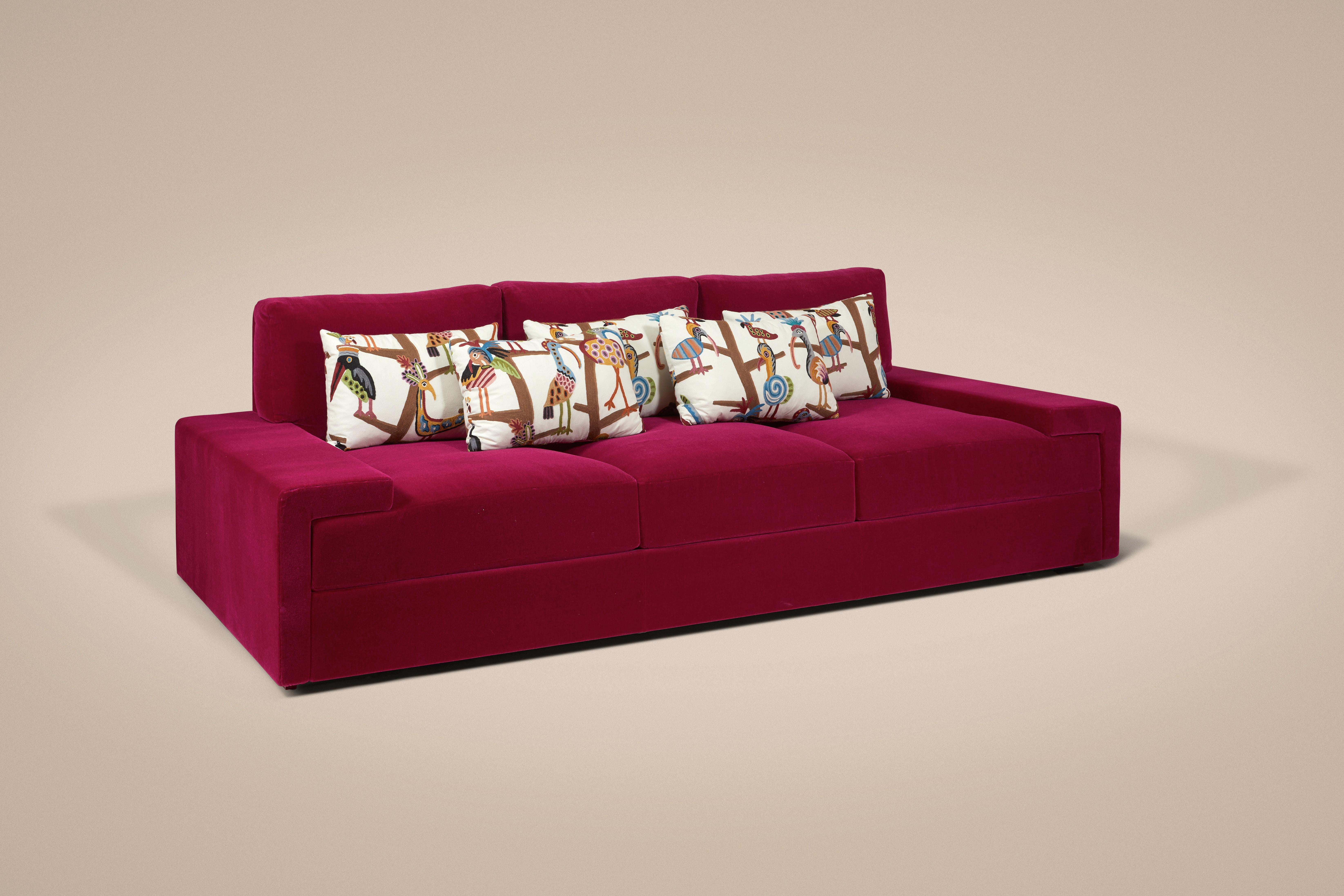 The Casa sofa is outfitted with large, flat armrests, lacquered wood feet, and raspberry red mohair velvet upholstery (LG.FB-18) for maximum comfort. Made with an oak structure, high-density foam, and topped with a down-filled cover for optimum