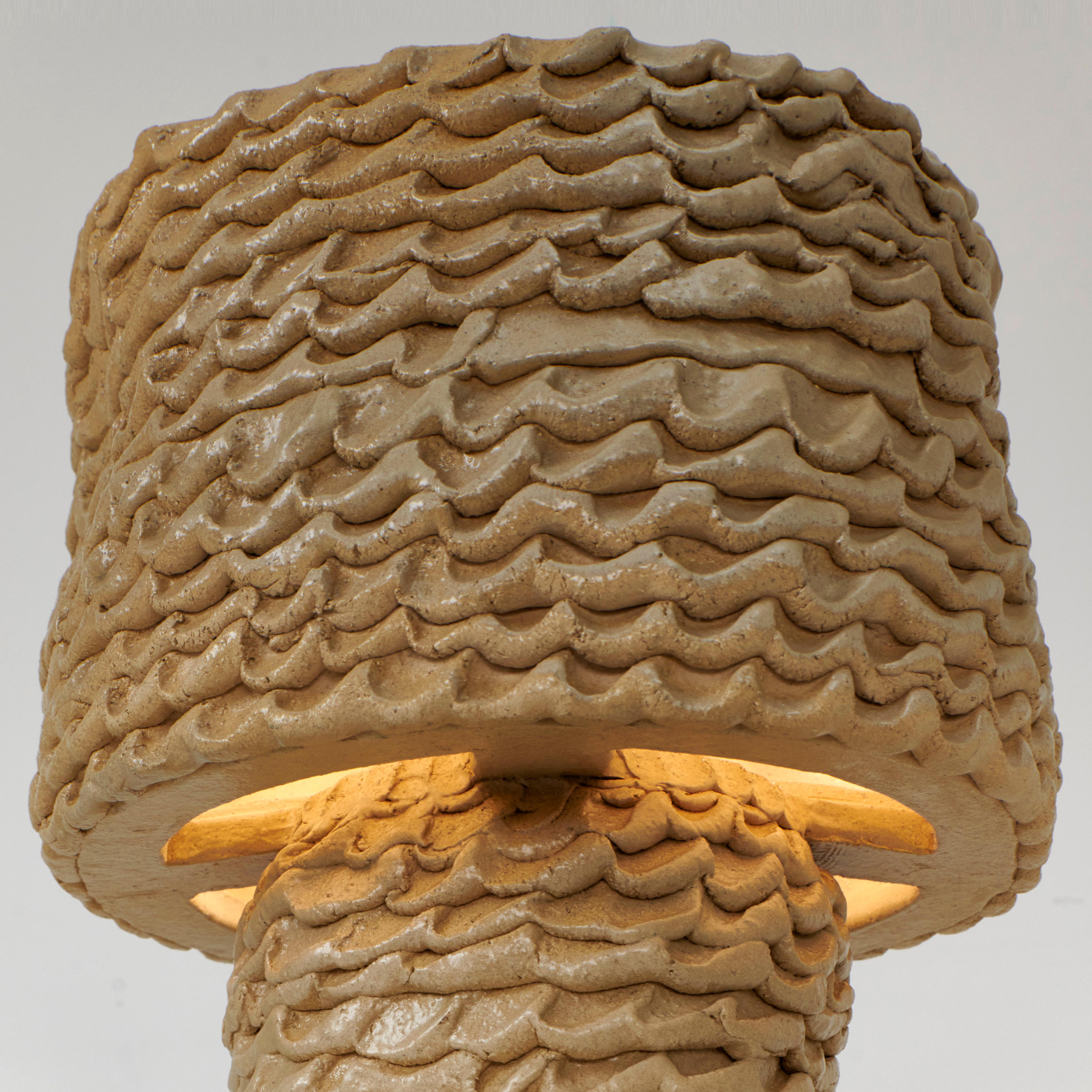 CASA TABLE LIGHT (round), designed in 2023.

Artisanal ceramic light with textured finish, made in Project 213A's own ceramic workshop. Each piece is unique due to its handmade nature, shapes and shades vary slightly.

Bespoke dimensions and colours
