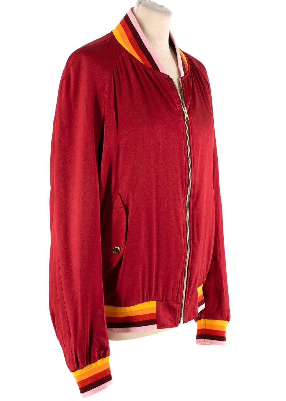 Casablanca Burgundy Silk-Satin Embroidered Souvenir Bomber Jacket

- Inspired by 70's sportswear,this silk bomber features retro souvenir jacket stylings and an embroidered 'Morocco' back panel
- Elasticated collar and cuffs in tonal stripe
- Raglan