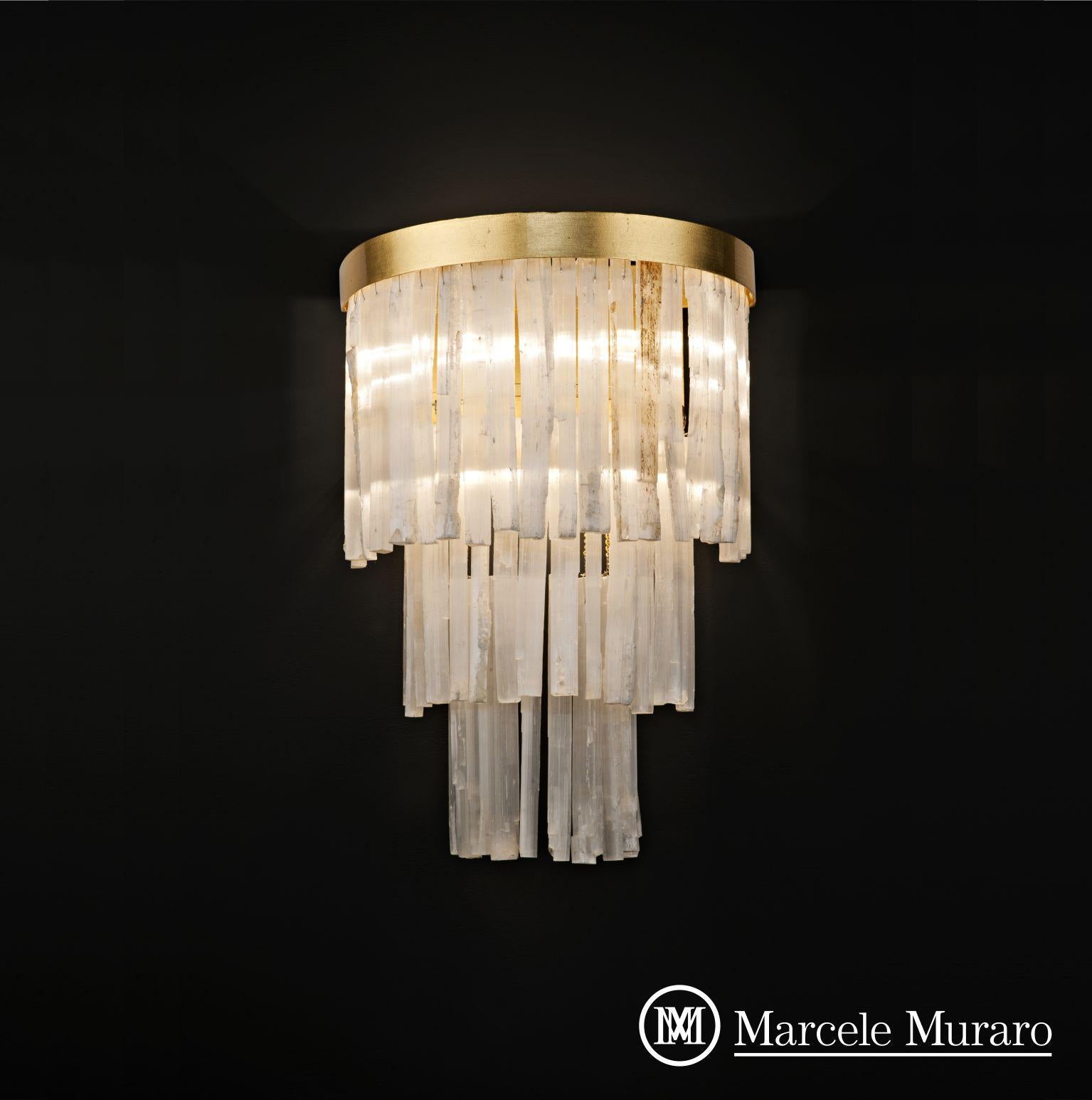 Casablanca wall sconce
Dimensions: D 20 x W 30 x H 55 cm 
Materials: Aluminum, plated. Natural Moroccan Stone. 
Lighting: 03 x G9
Finish: Silver Veneer, Aged Silver Veneer, Gold Veneer, Aged Gold Veneer, Copper Veneer, Aged Copper Veneer, Aged