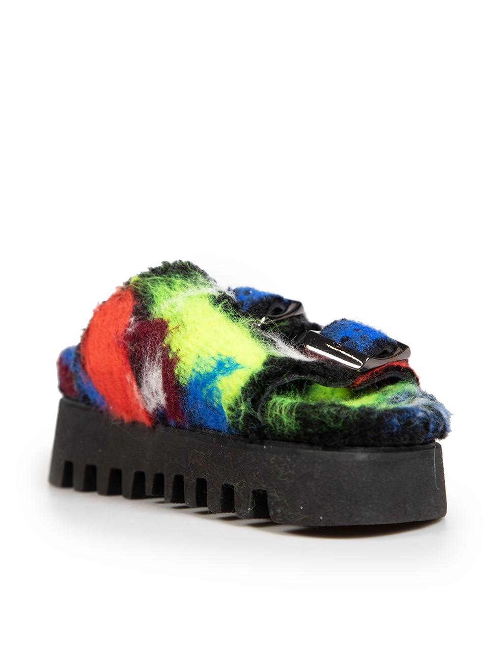 CONDITION is Very good. Hardly any visible wear to flats is evident on this used Casadei designer resale item. The item comes with a dust bag.
 
 
 
 Details
 
 
 Multicolour
 
 Felt
 
 Slides
 
 Platform
 
 Open toe
 
 2x Buckled straps
 
 
 
 
 

