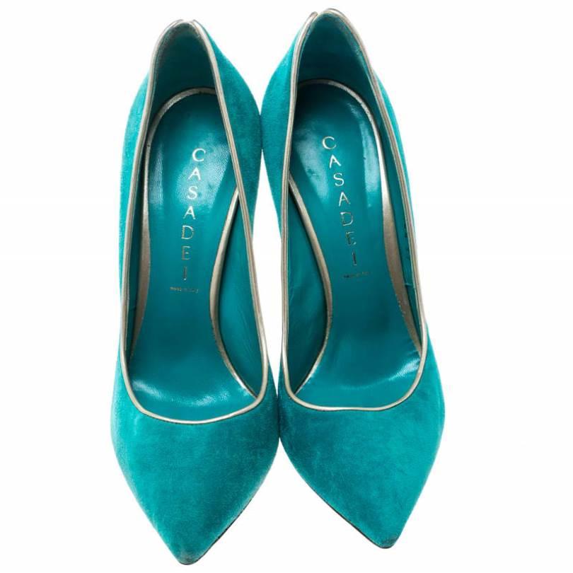 Designed to perfection, these pumps are from the renowned luxury house of Casadei. They are crafted from aqua green suede and designed with pointed toes and 12 cm heels. Look bright and lively in this pair.

Includes: Original Dustbag

