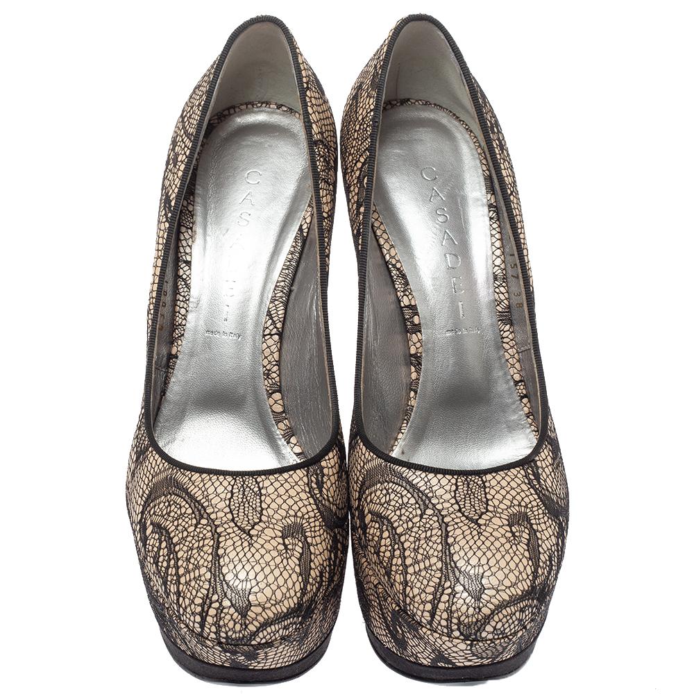 Perfect companions to your skirts and dresses, these Casadei pumps are totally worth buying! They come crafted from lace and satin in a round toe silhouette and styled with solid platforms and 14 cm heels. Comfortable leather-lined insoles ensure