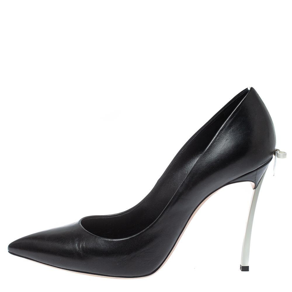 Perfect companions to your skirts and dresses, these Casadei pumps are totally worth buying! They come crafted from black leather in a pointed toe silhouette and are finished with trendy bows and the signature blade heels. Comfortable leather-lined