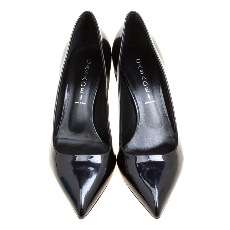 Chic and classy, these Casadei pumps will match well with a lot of your outfits! The black pumps have been crafted from patent leather and styled with pointed toes. They come equipped with comfortable insoles and 6 cm heels.

Includes: Original