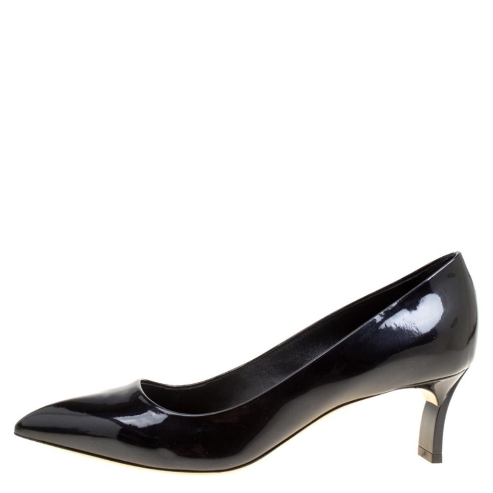 Chic and classy, these Casadei pumps will match well with a lot of your outfits! The black pumps have been crafted from patent leather and styled with pointed toes. They come equipped with comfortable insoles and 6 cm heels.

Includes: Original