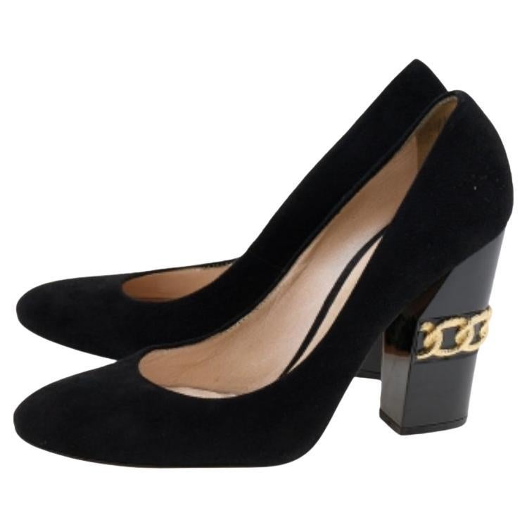 These Casadei pumps are a great choice if you’re looking to add a pair that's both classy and bold. The pair has been made in Italy from black suede and set on chain-embellished block heels.