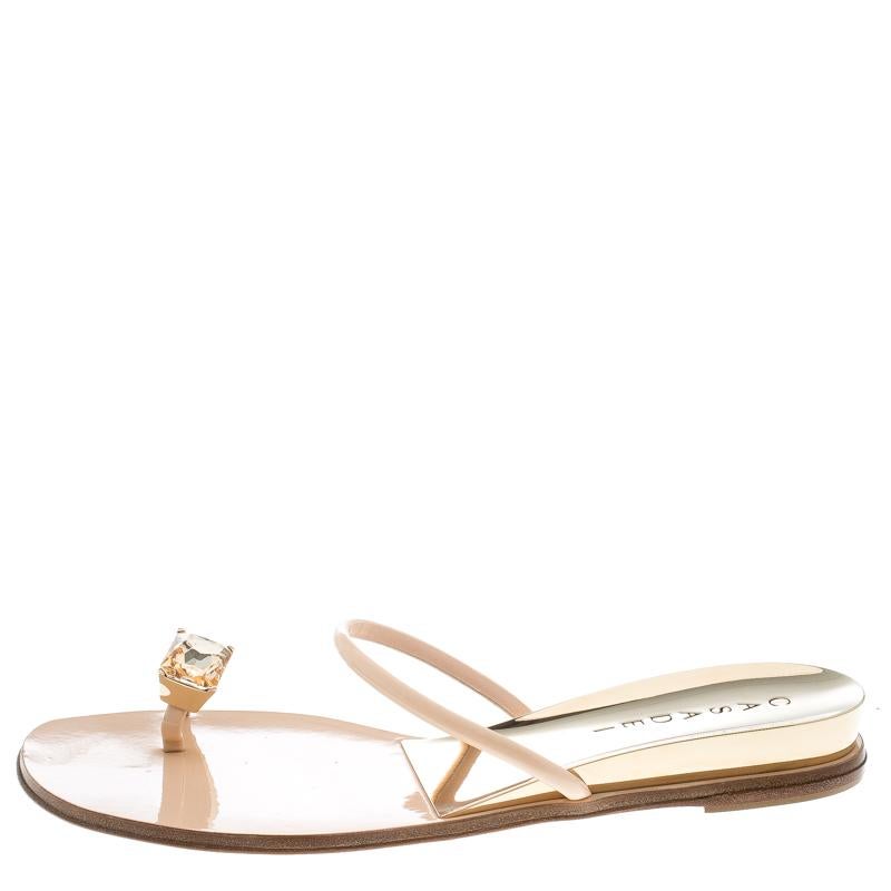 All of the creations from Casadei are designed in such a way that people will halt and stare. These sandals have been crafted from blushed pink patent leather and styled with crystal embellishment on the toe rings and a single strap across the