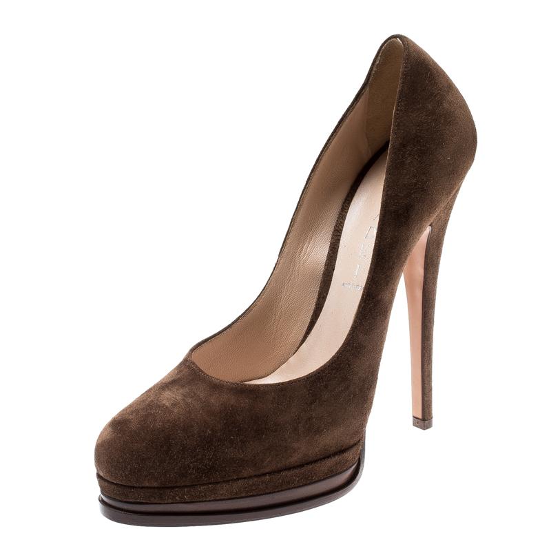We've fallen in love with these gorgeous pumps from Casadei! Simple and sophisticated, the brown pumps are crafted from suede and styled with almond toes. They come equipped with comfortable leather-lined insoles and are elevated on solid platforms