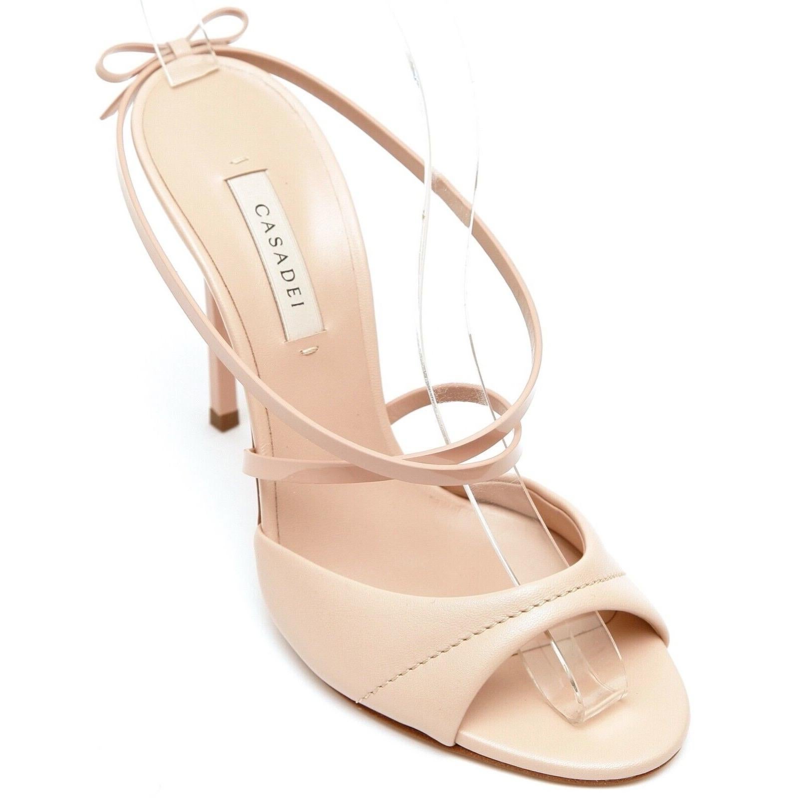 GUARANTEED AUTHENTIC CASADEI PENNY BLADE LEATHER MULE SANDALS

Retail excluding sales taxes, $895

Design:
- Blush pink leather PENNY blade sandals.
- Thin strap over top of foot.
- Wider strap over vamp.
- Bow at back of foot.
- Blade style