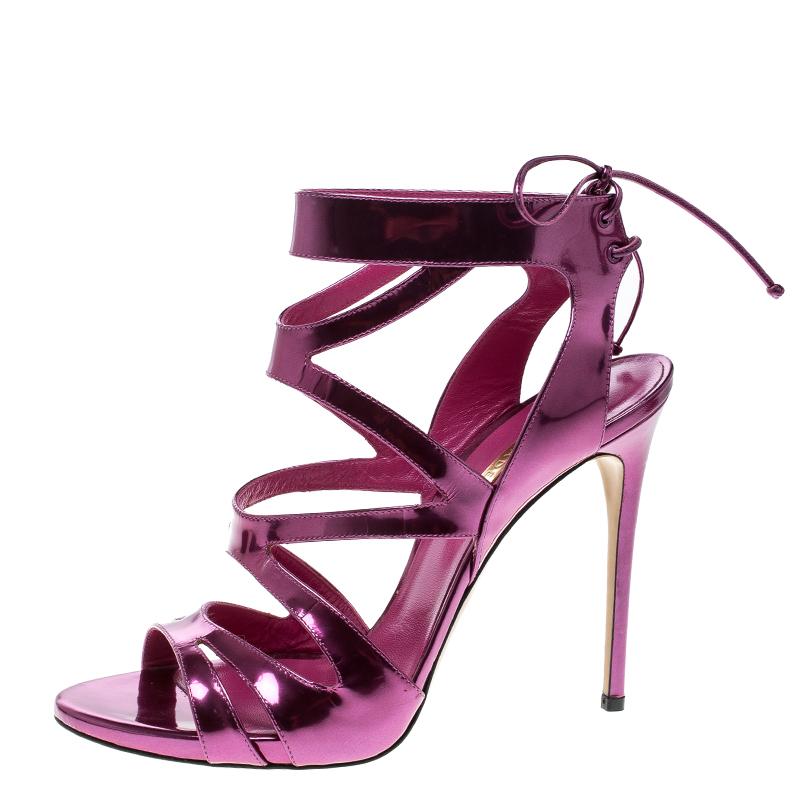 Add a whole new layer of style to your look with these stunning heels from Casadel in a bright and metallic shade of pink. With a unique style and design, these shoes stand stylish on tall heels and feature a lace up detail on the back of the