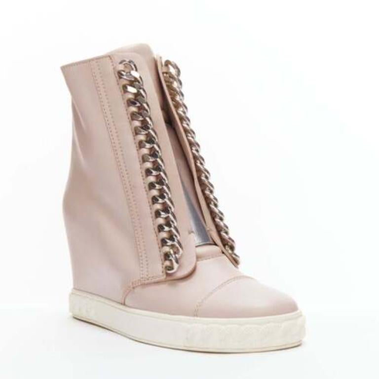 CASADEI pink leather silver chain trim ankle wedge sneakers EU39.5
Reference: AAWC/A00557
Brand: Casadei
Material: Leather, Metal
Color: Pink, Silver
Pattern: Solid
Closure: Zip
Lining: White Leather
Extra Details: Back zip.
Made in: