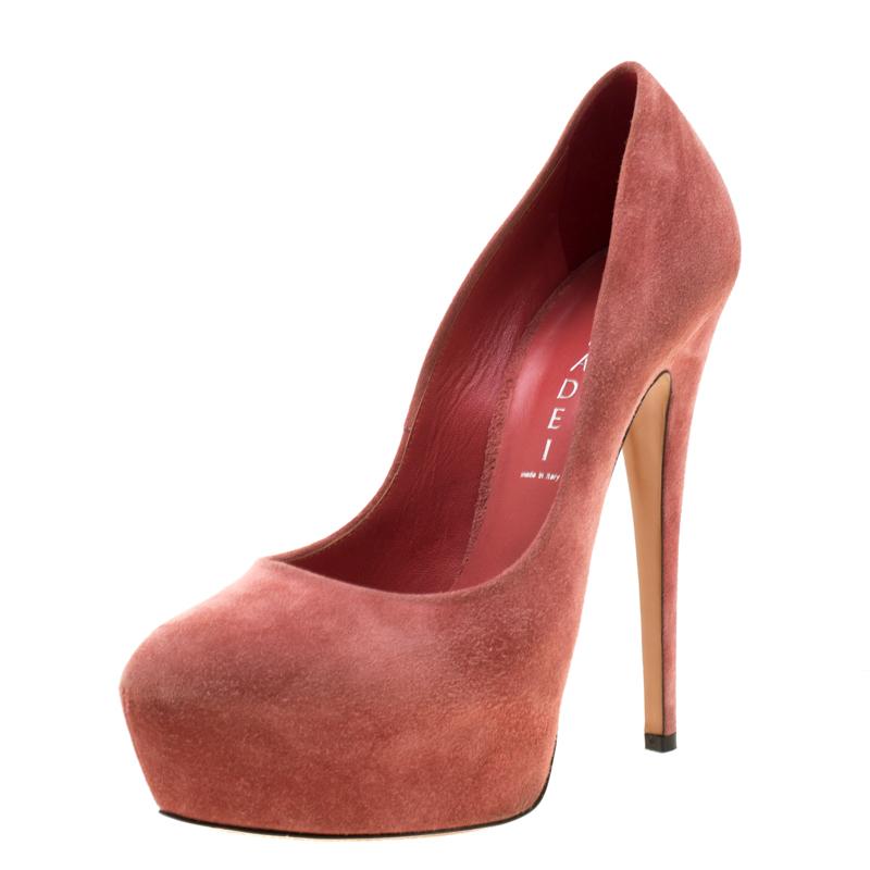 We've fallen in love with these gorgeous pumps from Casadei! Simple and sophisticated, the pink pumps are crafted from suede and styled with leather-lined insoles, concealed platforms and 15 cm heels. Pair them with your cocktail gowns and dresses