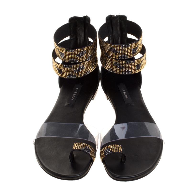 You'll truly be in utter love with these sandals from Casadei as they are stylish and modern. They've been crafted from stretch bands embellished with crystals, PVC straps across the vamps and zippers on the counters. The sandals are just perfect to