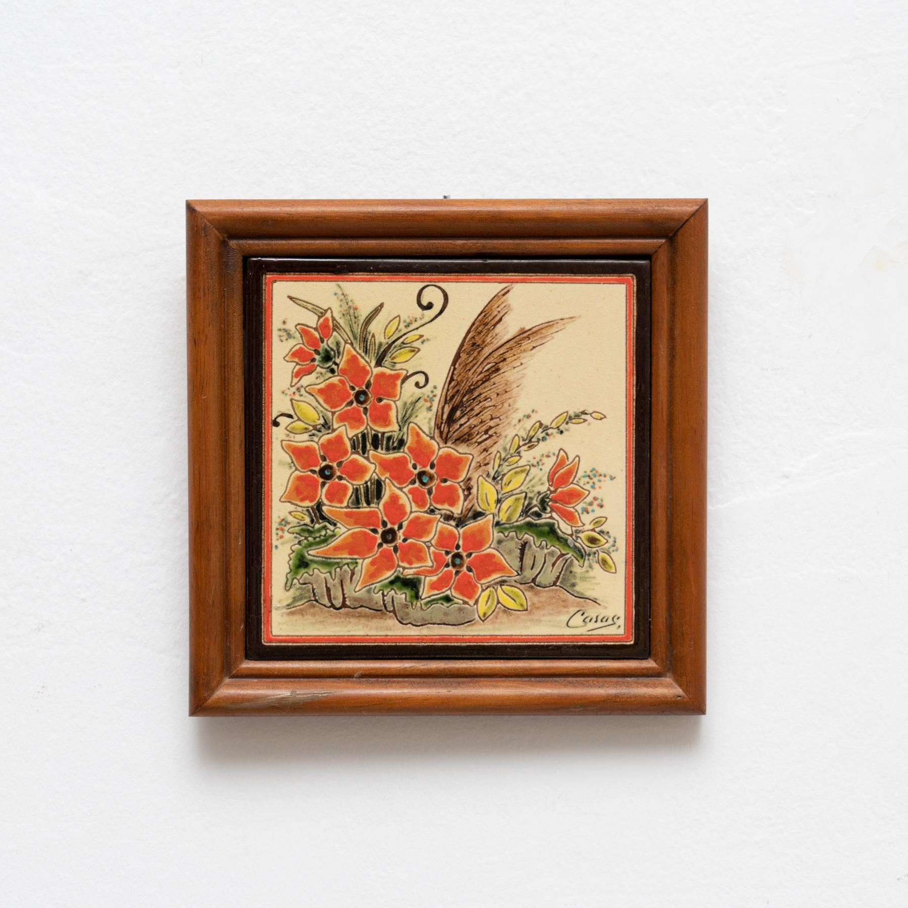 Ceramic hand painted floral artwork by Catalan artist Casas, circa 1960.
Framed. Signed.

In original condition, with minor wear consistent of age and use, preserving a beautiul patina.