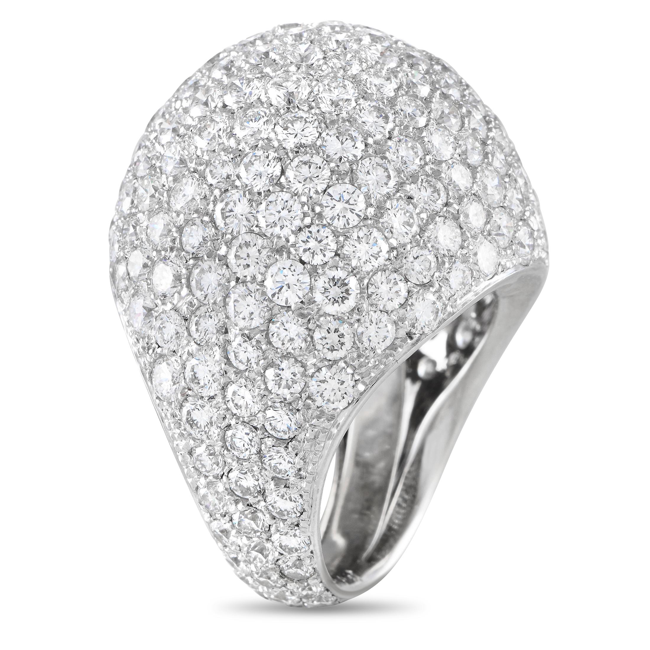This Casato ring is undeniably luxurious. Covered in round-cut diamonds with a total weight of 13.31 carats, this impressive piece will continually radiate light every time its worn. Crafted from 18K white gold, it features a 7mm wide band and a