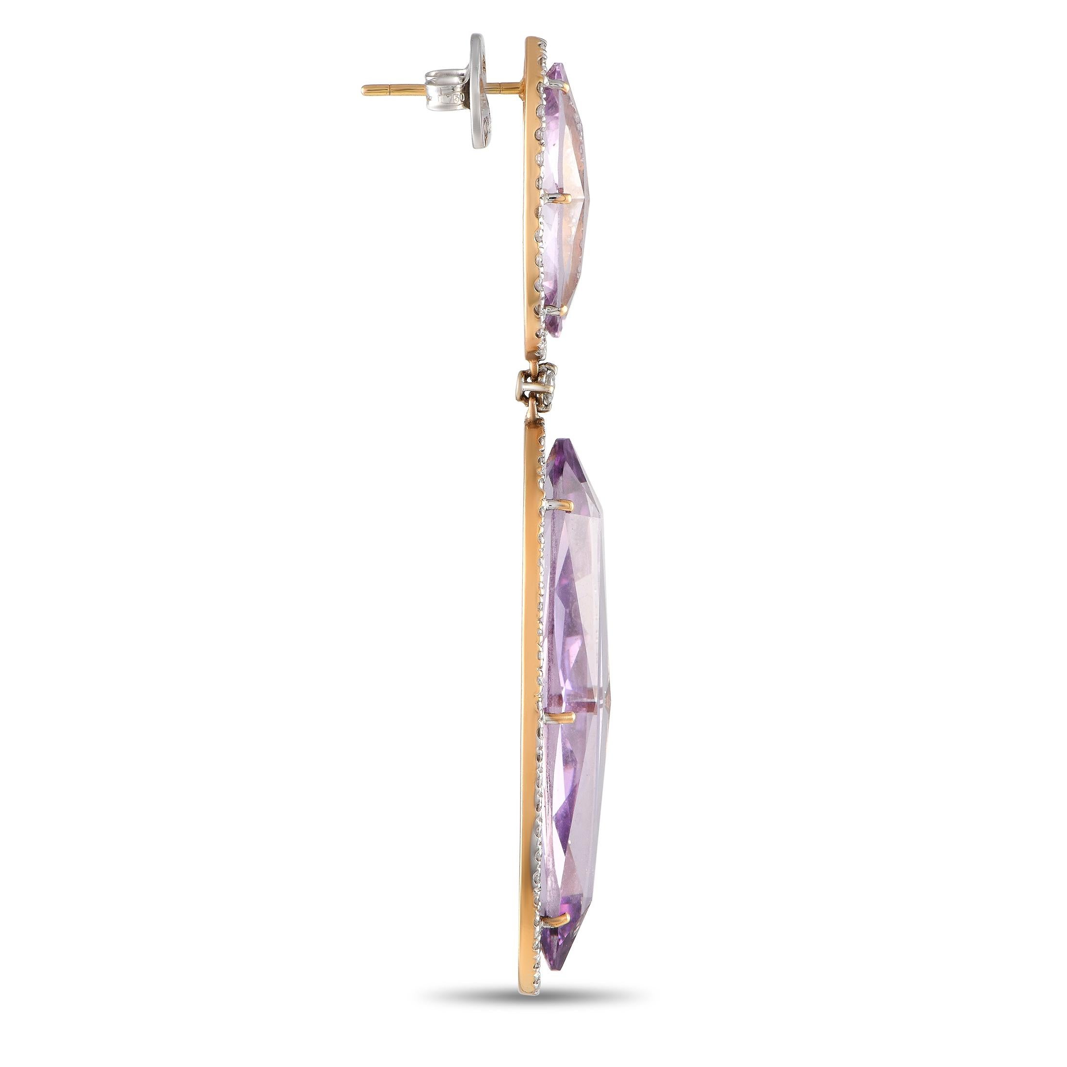 These gemstone earrings can add both elegance and whimsy to your ear game. Created by Casato, this pair is clad in 18K yellow gold and has a pushback post bearing an oval amethyst on six prongs haloed by diamonds. Dropping gently from each earring