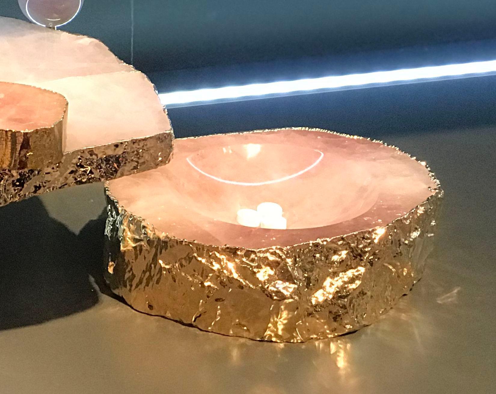 This hand-carved, solid semi-precious rose quartz gemstone bowl is drenched in electroplated 24-karat gold. It is substantial and authentic, designed to last a lifetime.