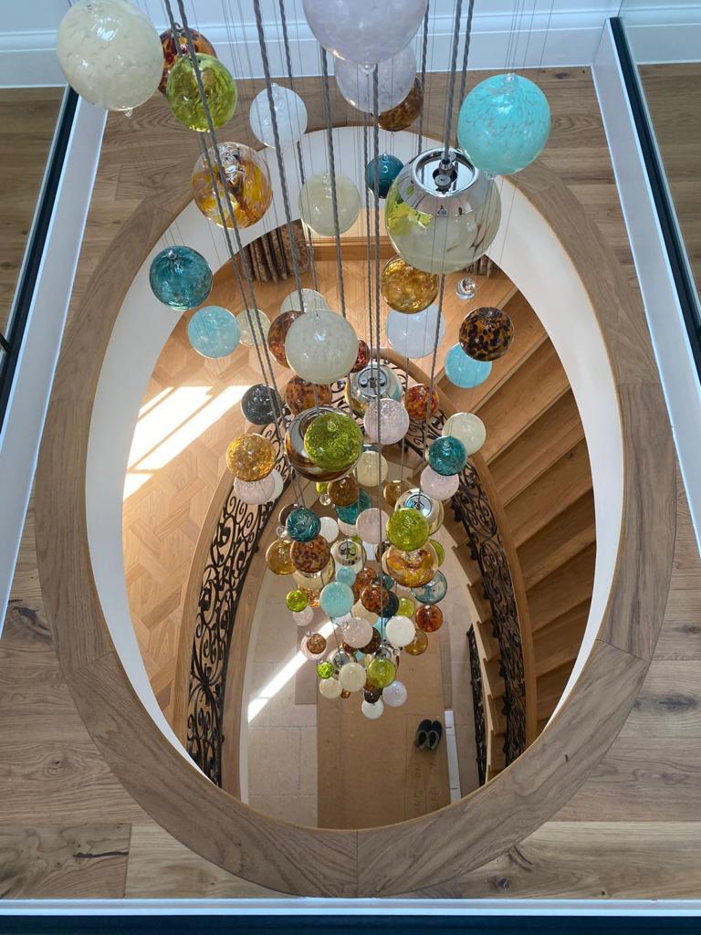 Modern Cascade Chandelier by Roast Featuring over 150 Individually Blown Glass Spheres For Sale