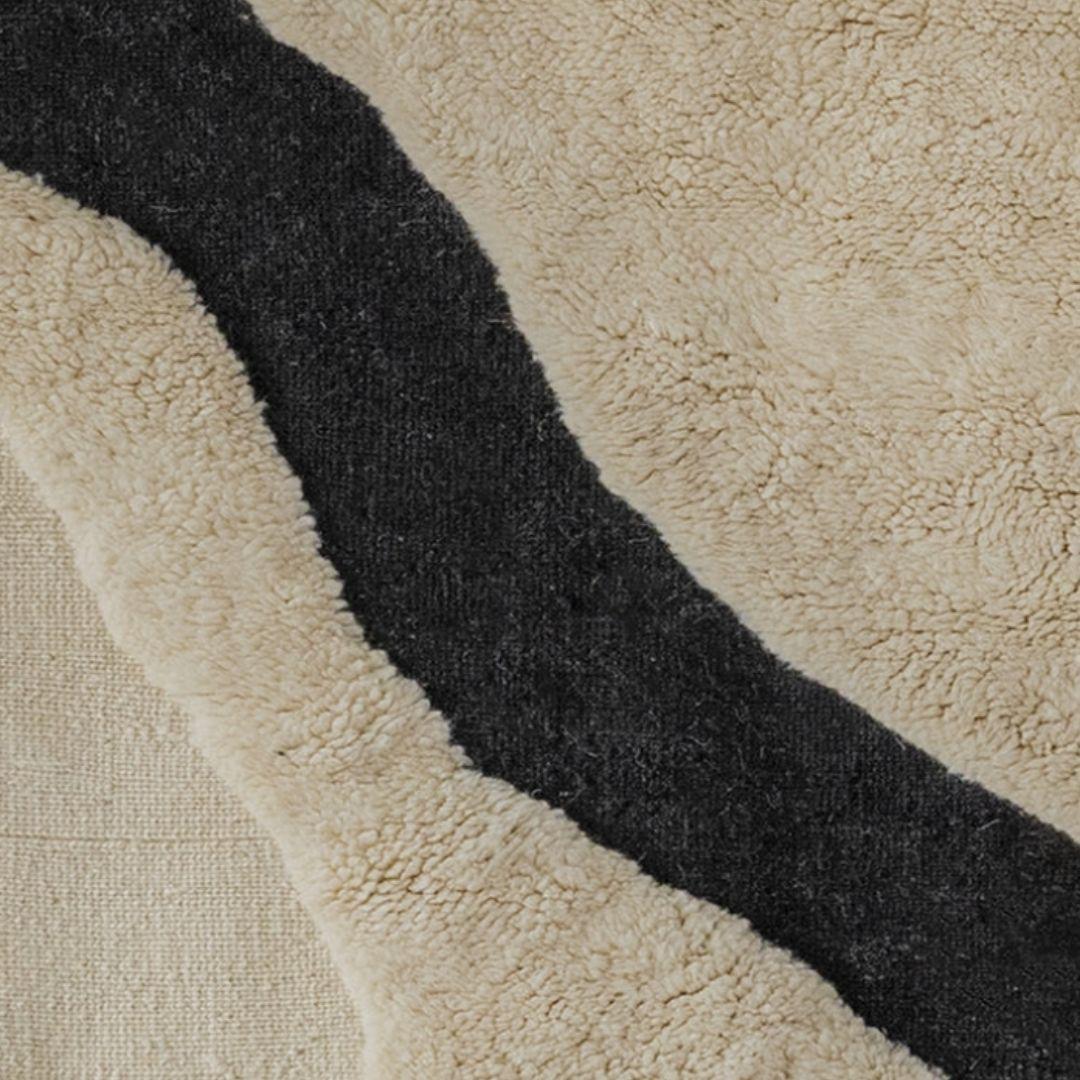 OBSIDIAN DRIFT COLLECTION

Cascade was unveiled at the prestigious New Orleans Social Club, where ancient Berber artistry seamlessly intertwined with the city’s vibrant, eclectic design landscape.

Drawing inspiration from the flowing curves and