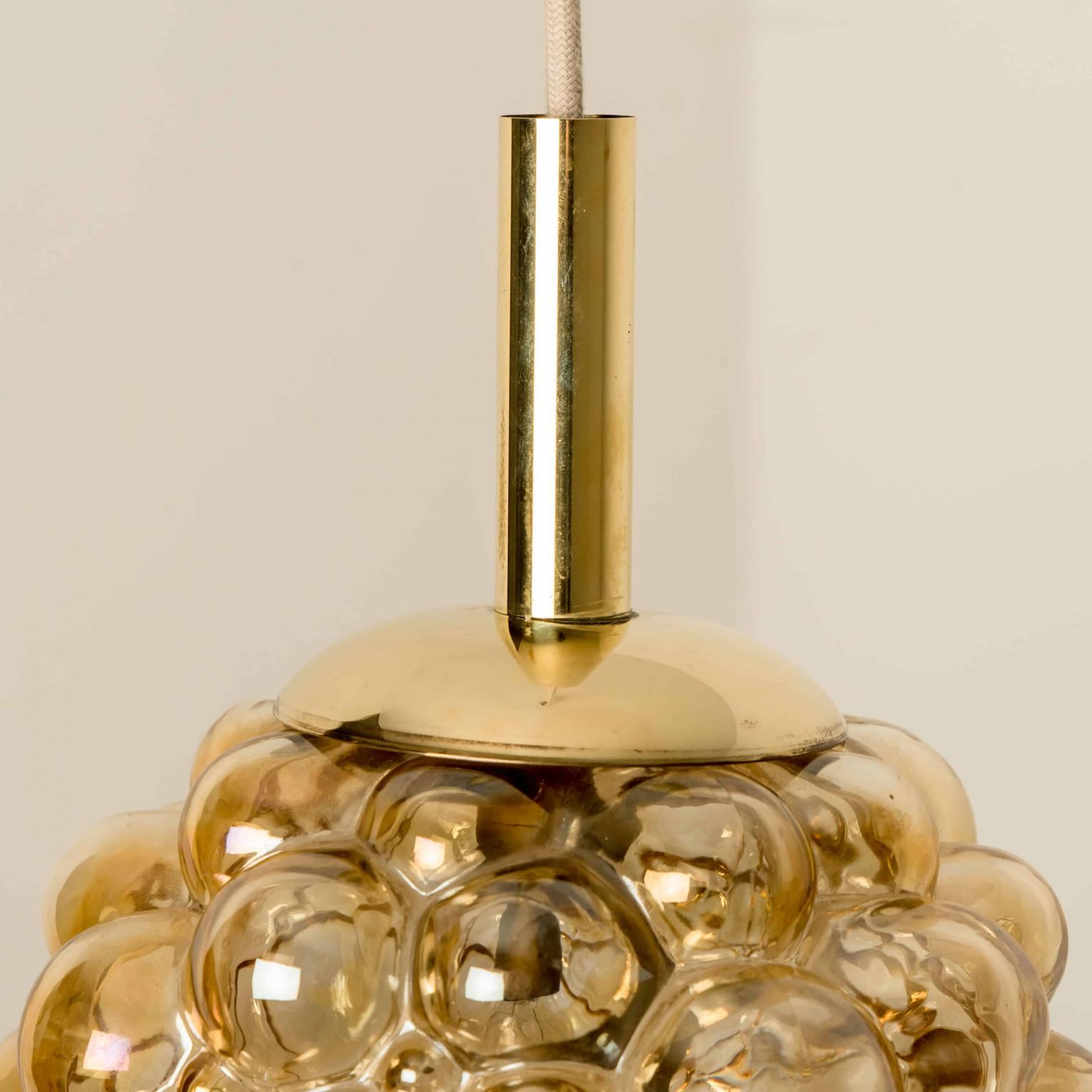 Vetro soffiato Cascade Fixture with Eight Bubbled Glass Pendants by Helena Tynell, Germany 1970 in vendita