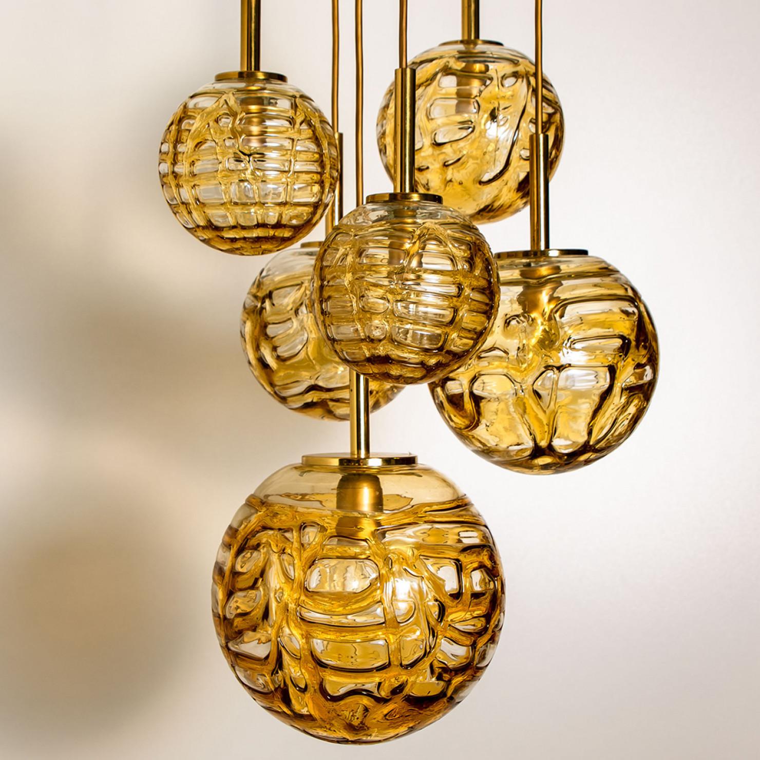 Absolutely amazing huge high-end ceiling mount pendant light fixture with six different globes by Doria Leuchten, manufacturered around 1960s. With hand blown heavy and high quality murano glass globes in 6.7