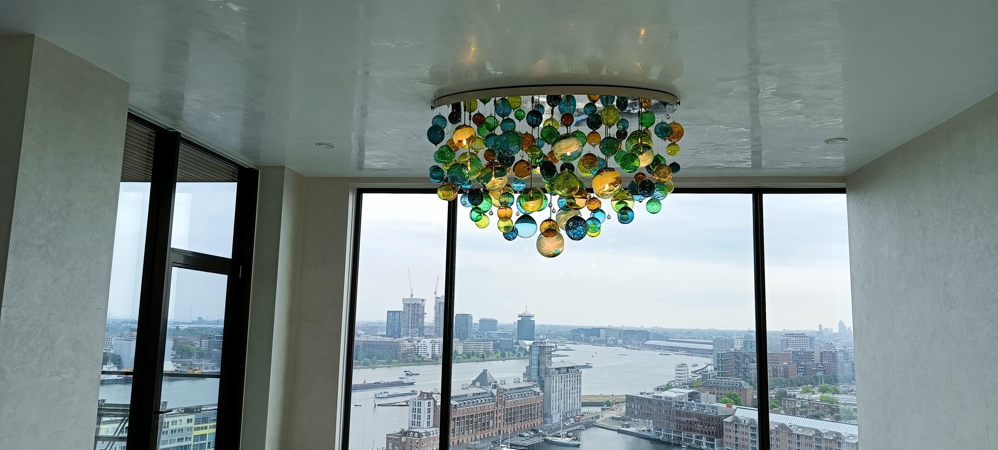 British Cascade Oval Chandelier by Roast Featuring Individually Blown Glass Spheres For Sale
