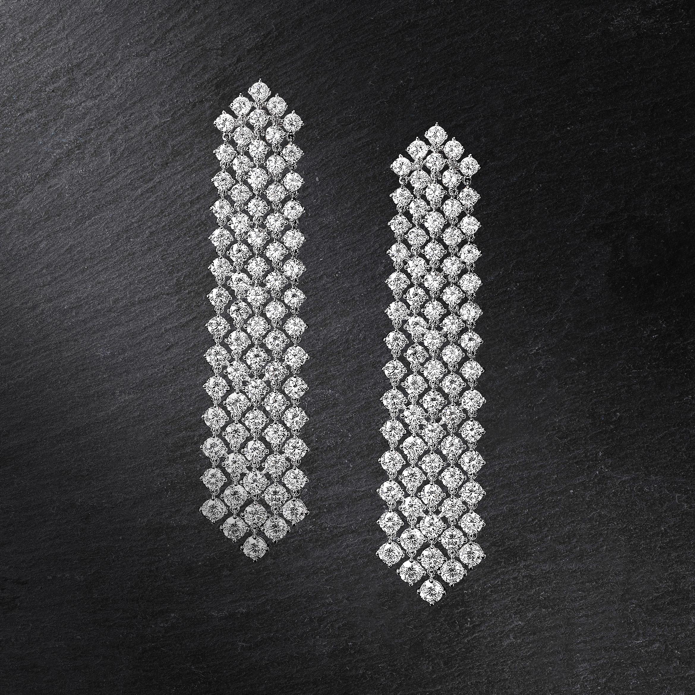 Cascade Round Diamond Earrings.

These magnificent Cascade Round Diamond Earrings are truly stunning! They are 18K white gold and feature 22.67 CARAT diamonds. The length is 8cm, and they are just perfect for that special someone who loves sparkle