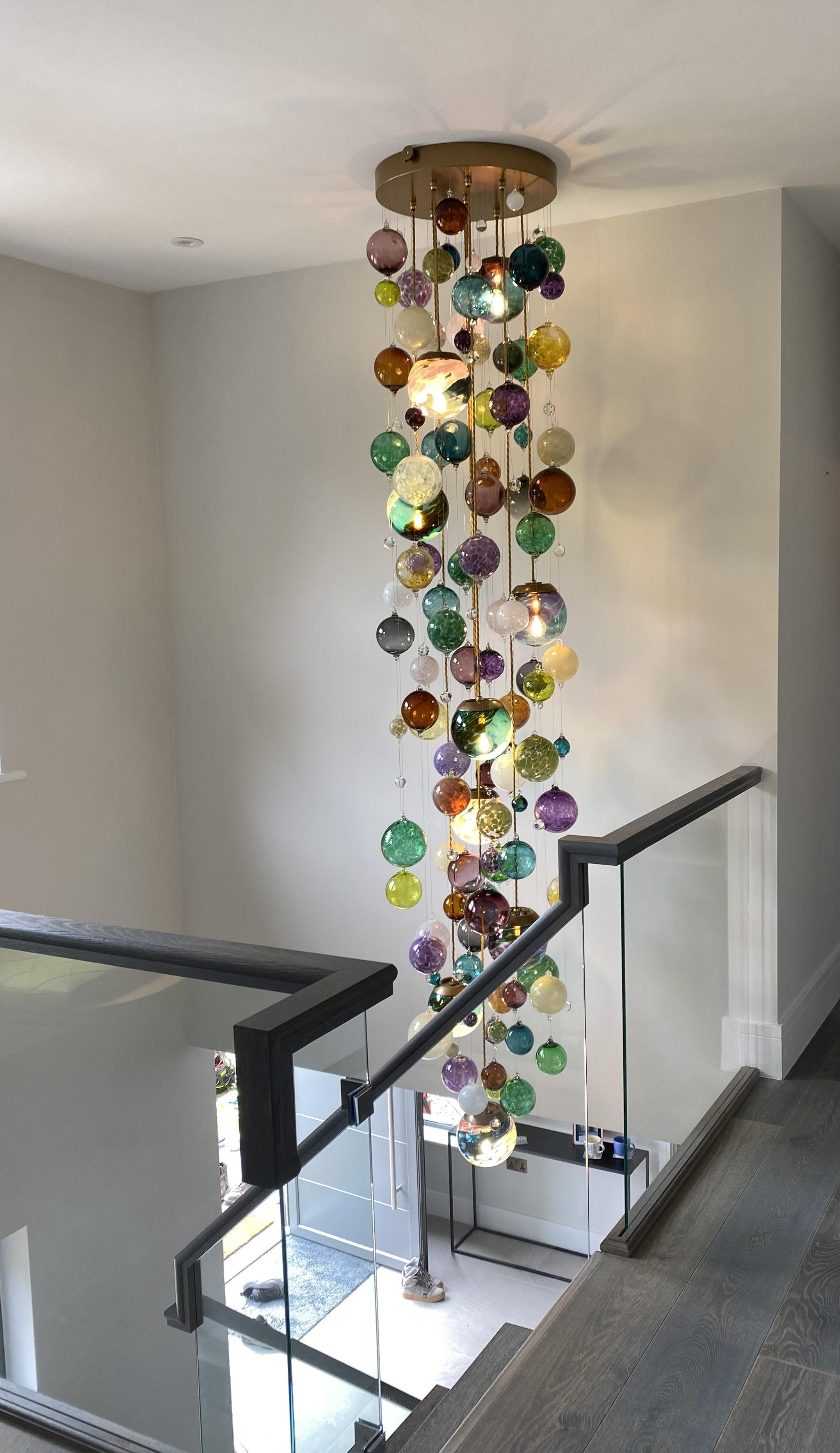 Modern Cascade Stair Chandelier by Roast Featuring Individually Blown Glass Spheres For Sale