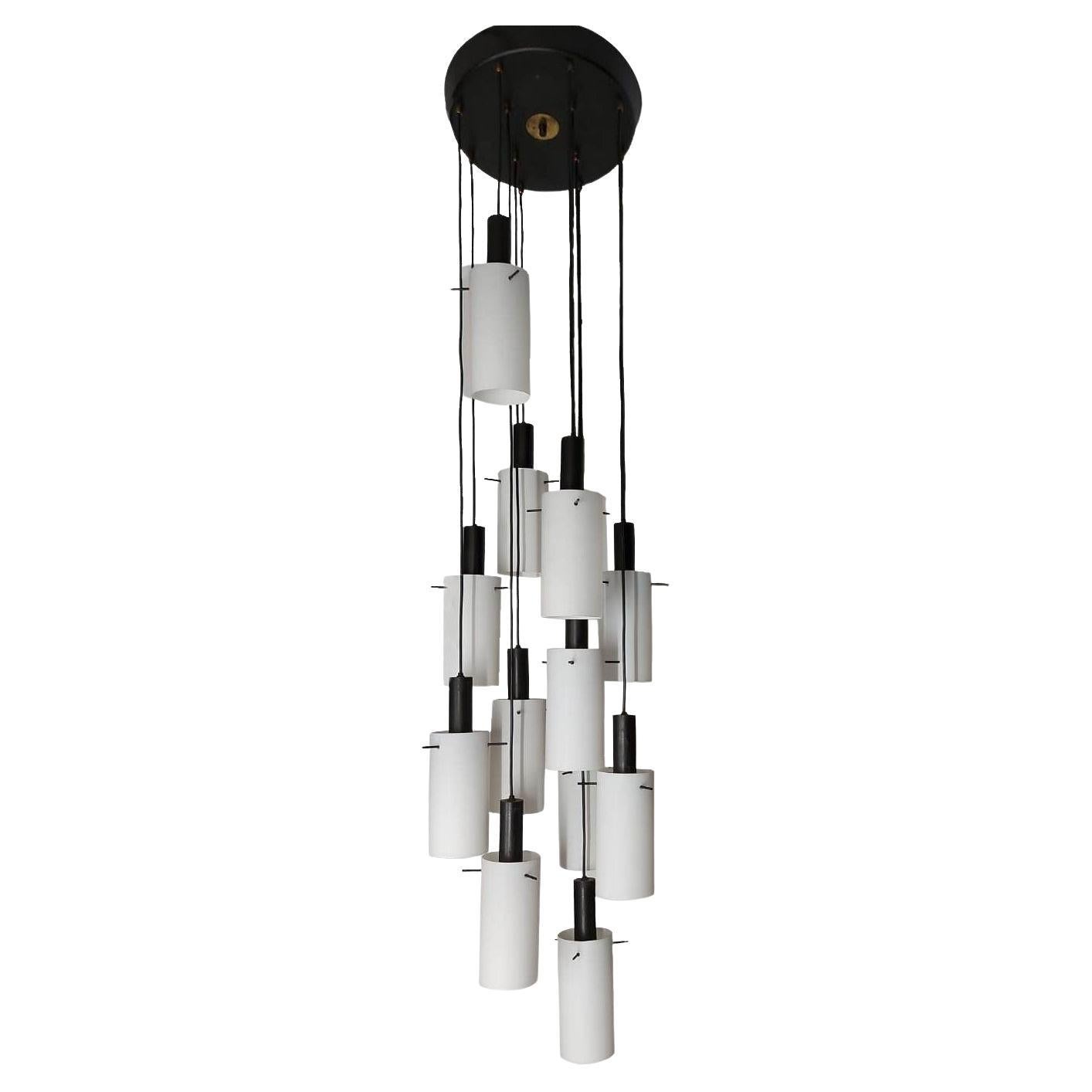 Lampadario a cascata con 12 lampade a sospensione attribuite  a Stilnovo, Italia anni '60 in vendita