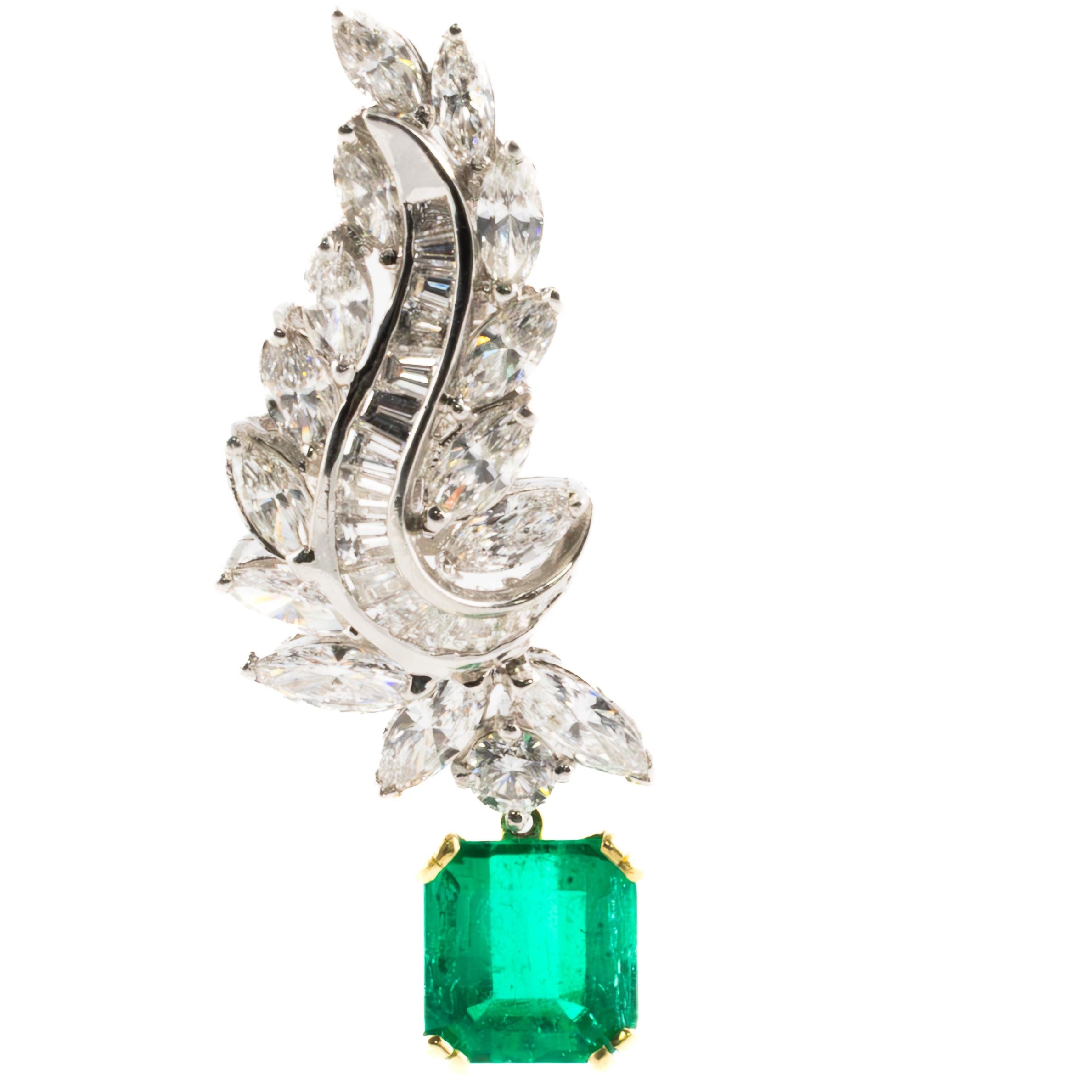 An embodiment of timeless sophistication, these remarkable earrings feature a stunning cascade of diamonds culminating in two striking emerald-cut emerald drops. The emeralds, totaling 7.76 carats, display a vivid green hue and are detachable for