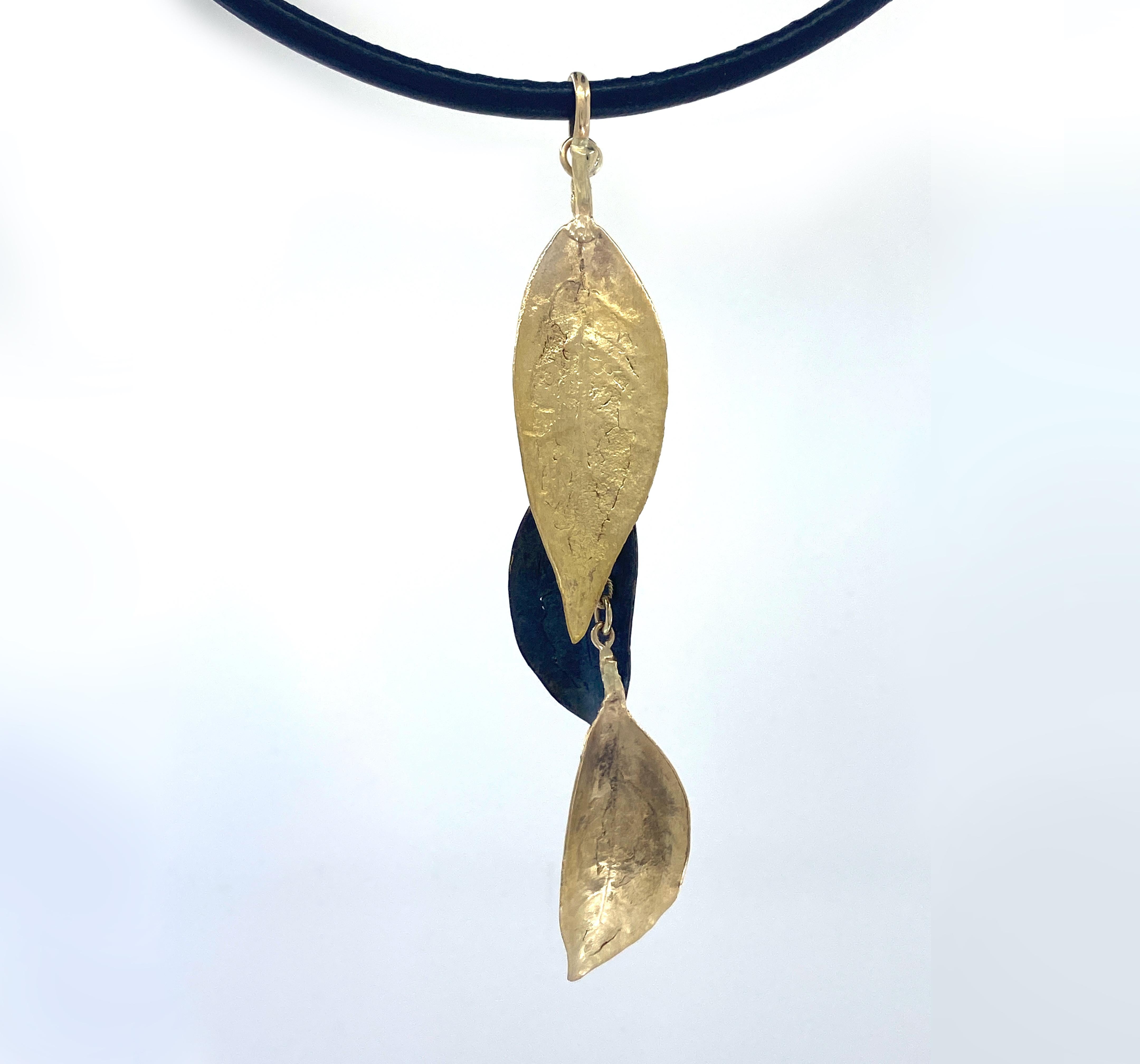 Contemporary Cascading Leaves Pendant in Yellow and Oxidized Gold