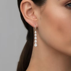 Cascading Pear Shape Drilled Diamonds Drop Earrings in 14K Gold